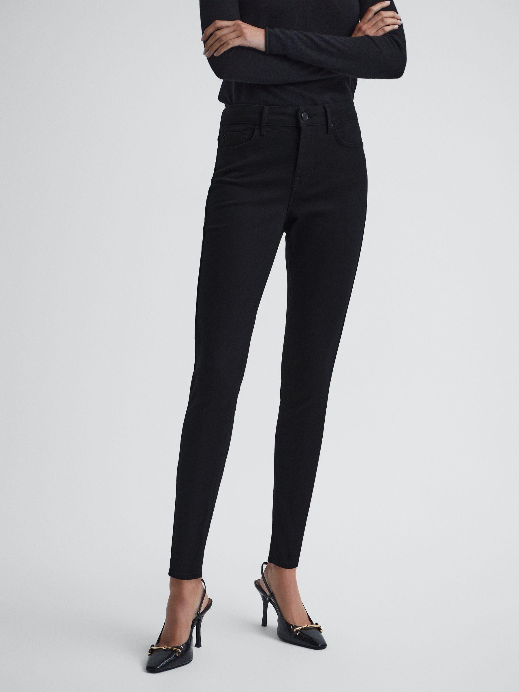 Mid Rise Skinny Jeans in Black Product Image