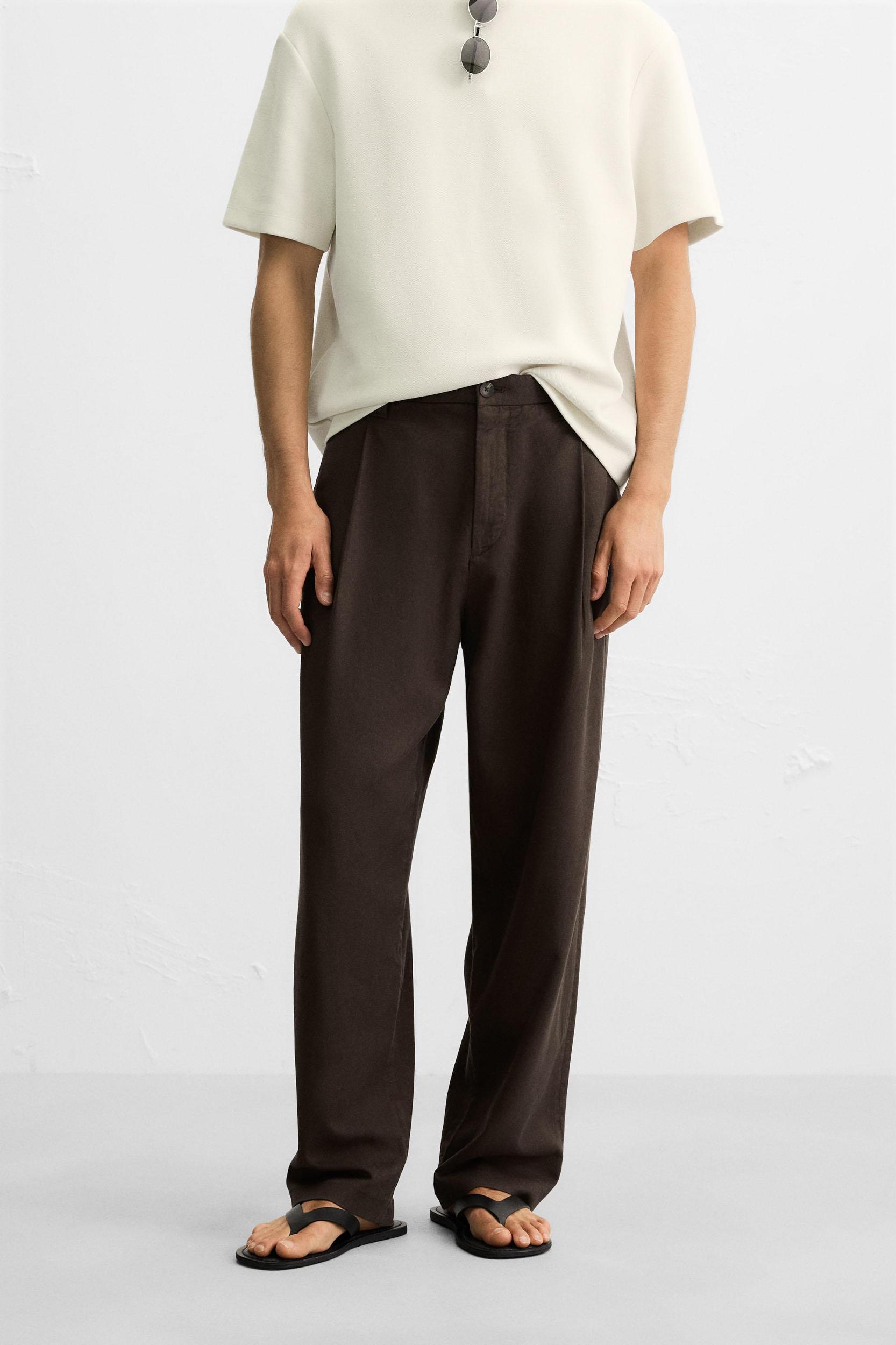 FLOWY PLEATED PANTS Product Image
