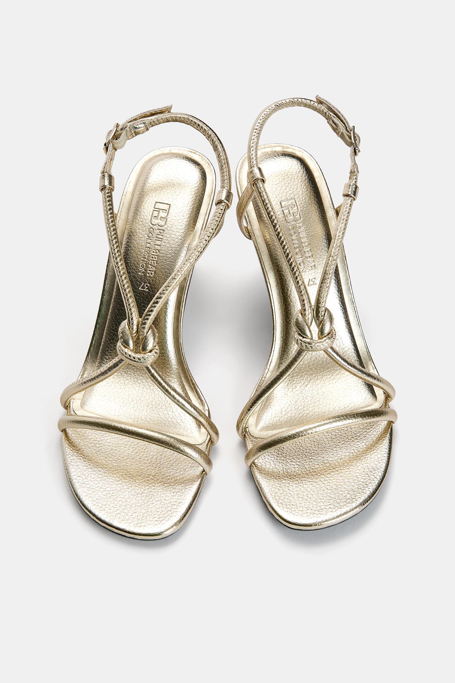 Heeled sandals with knot Product Image