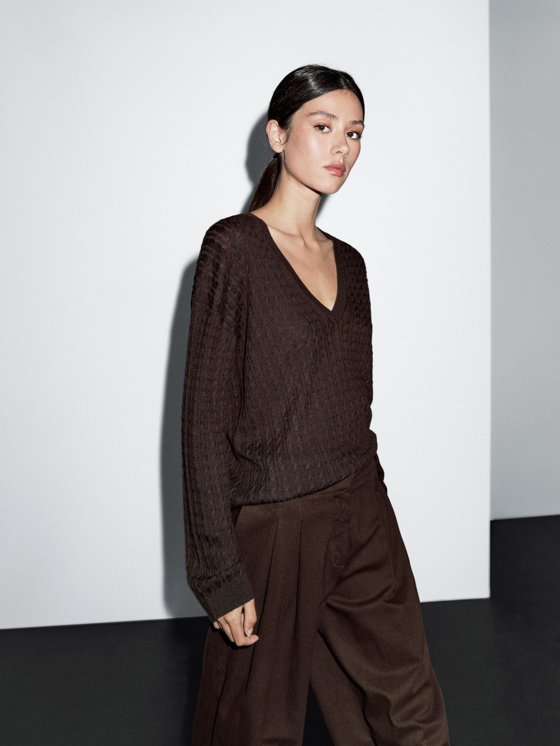 V-neck cable-knit sweater Product Image