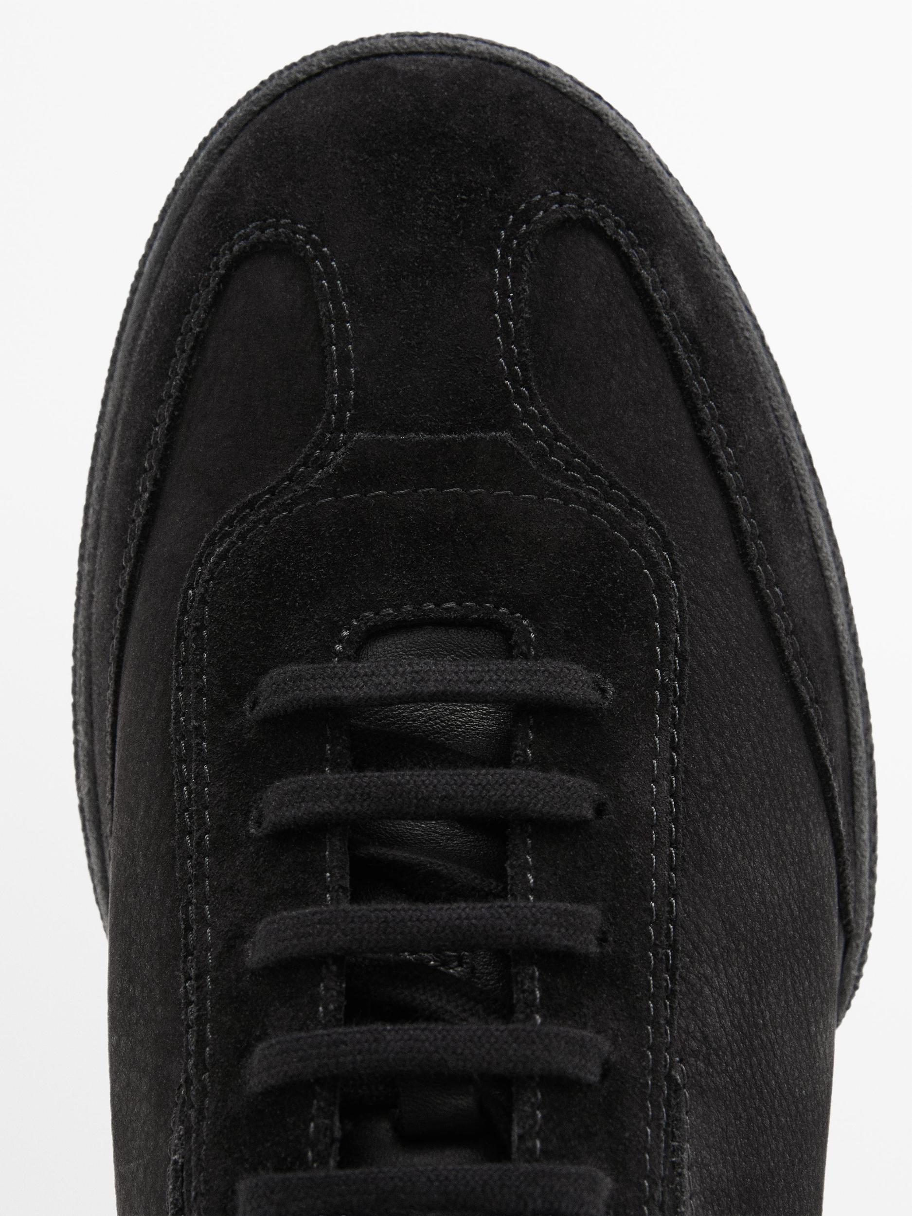 Split leather trainers with contrast soles Product Image