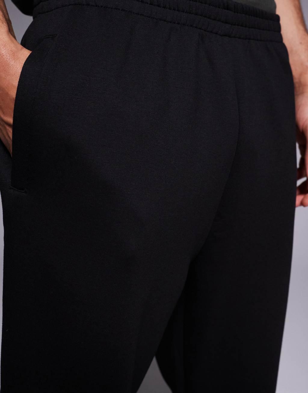 4505 Icon quick dry tapered fit performance sweatpants in black  Product Image