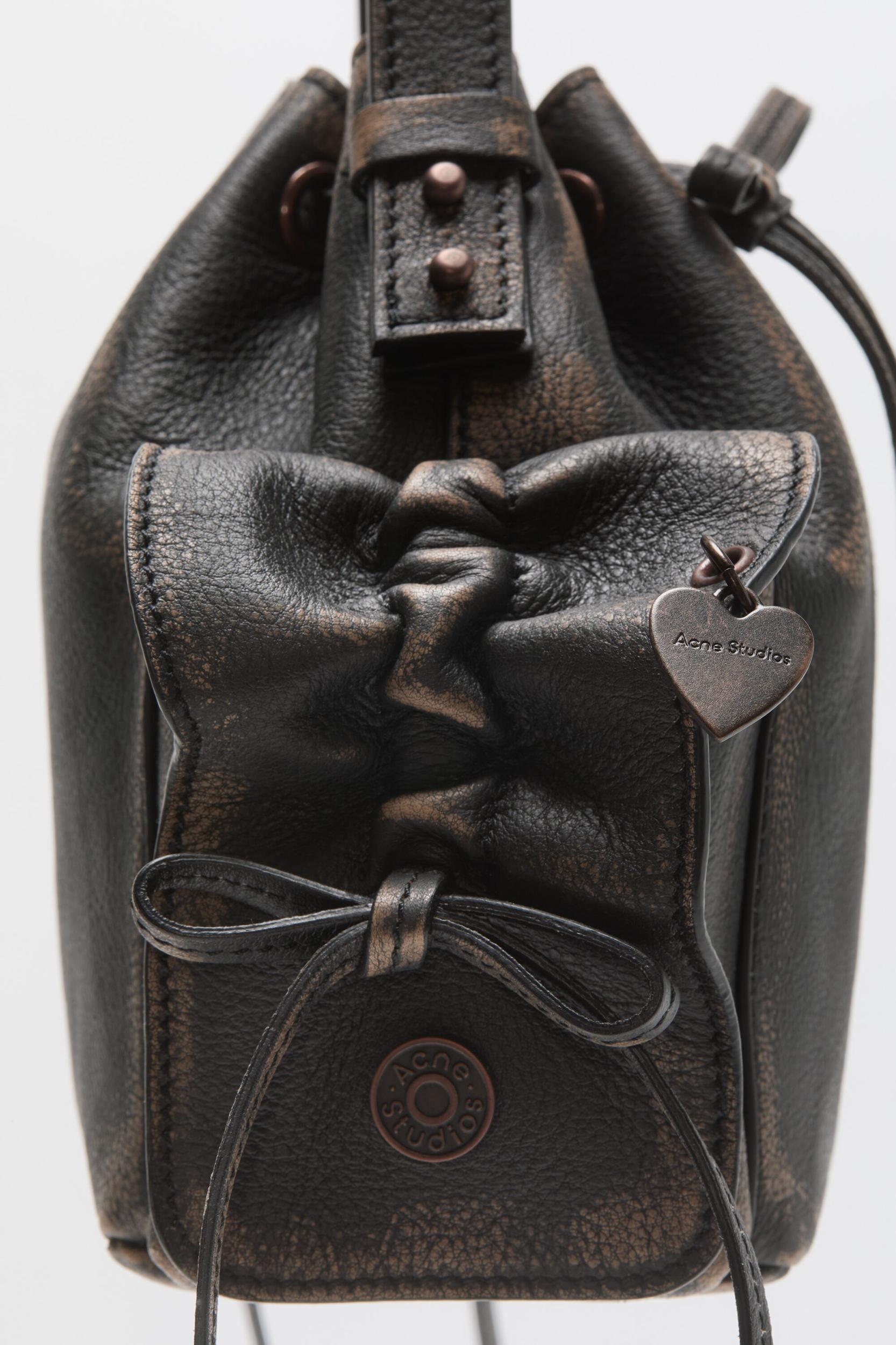 Multipocket mini bucket bag Product Image