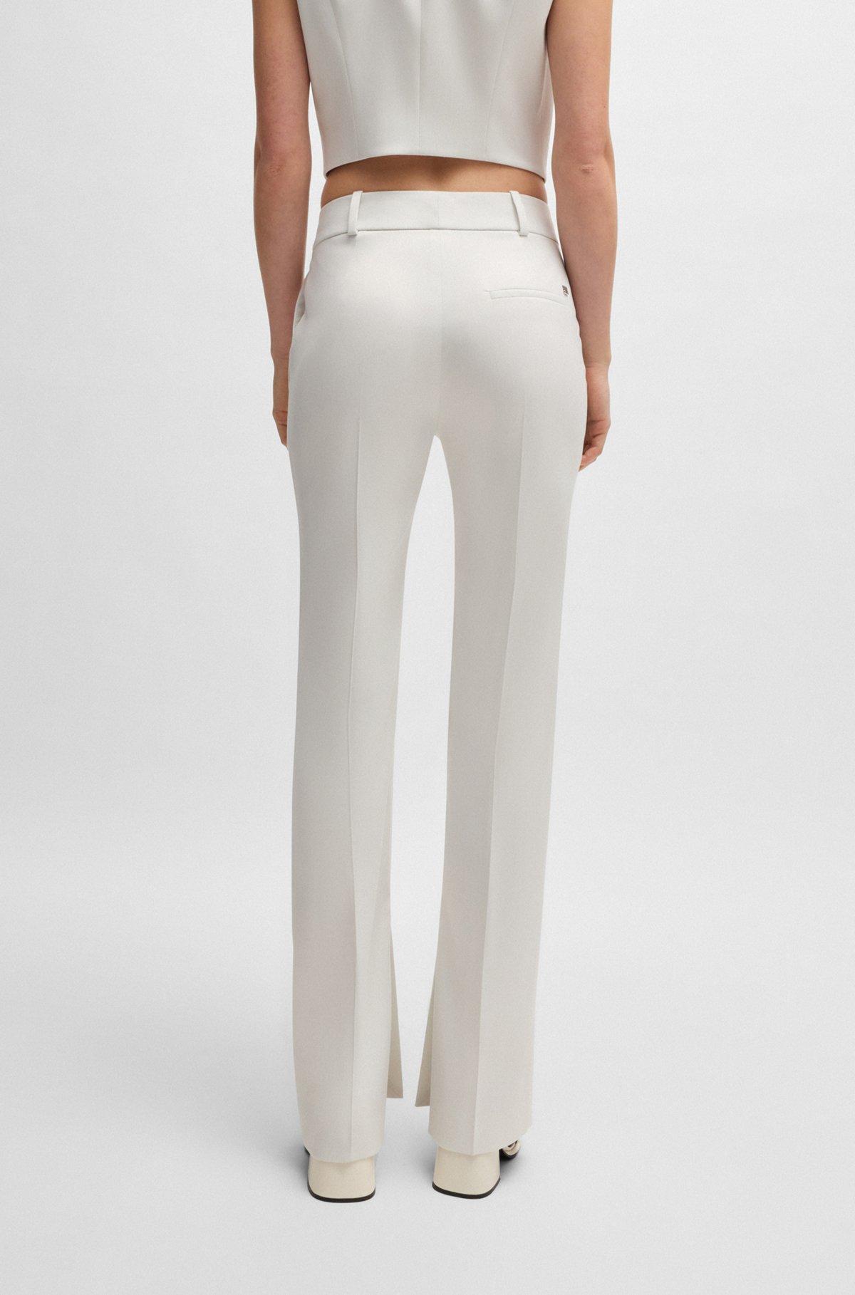 Slim-fit trousers in shimmer fabric Product Image