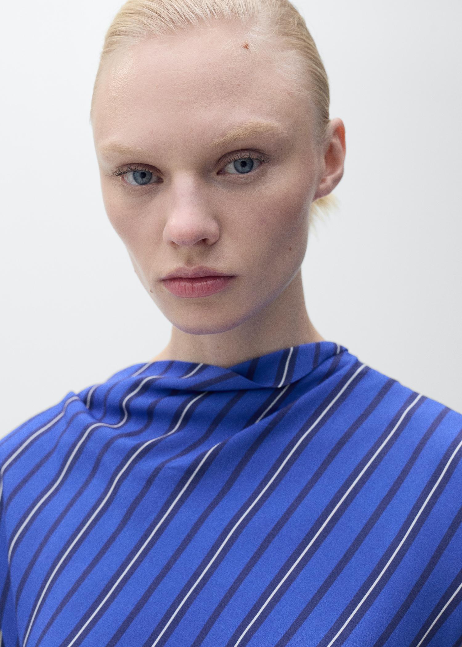 Asymmetrical striped blouse - Women | MANGO USA Product Image