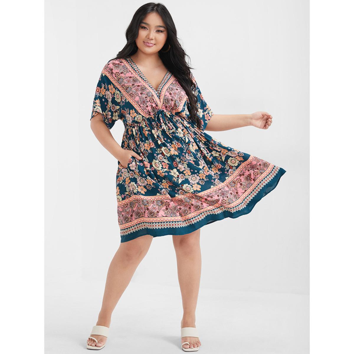 Plus Size Floral V Neck Elastic Waist Pocket Ruffles Knee Dress Indigo Women Vacation Printed V-neck Short sleeve Curvy Knee Dress BloomChic 14-16/1X Product Image