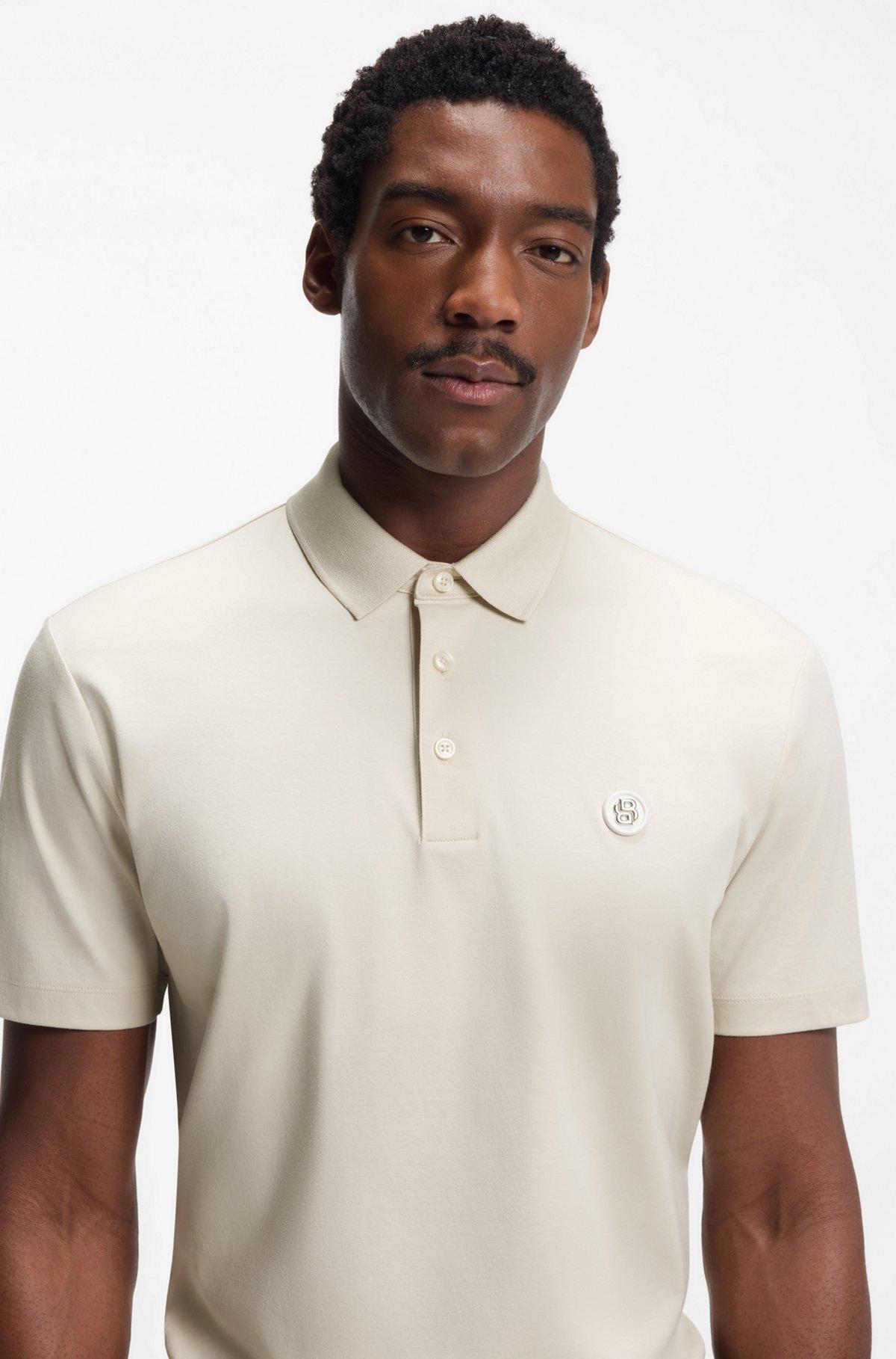 Monogram-jacquard polo shirt in cotton Product Image