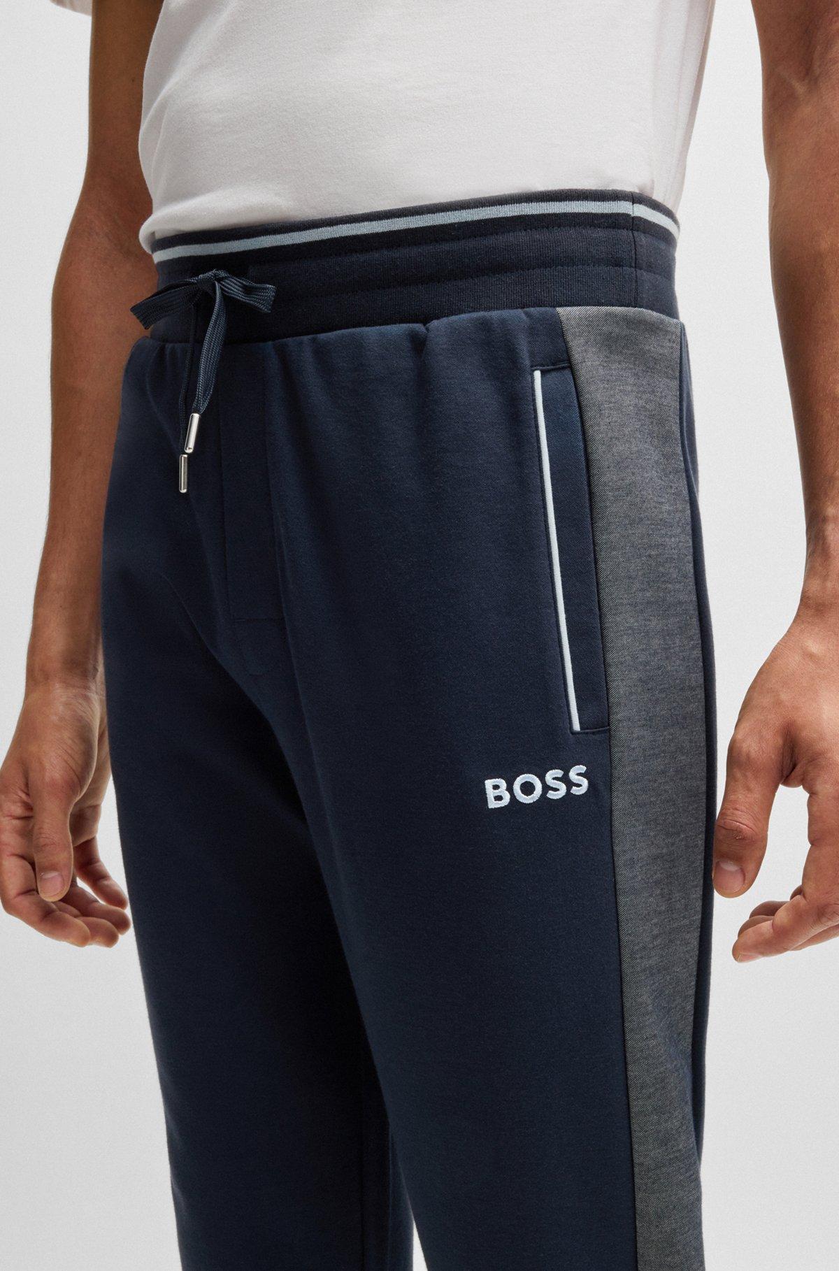 Tracksuit bottoms with contrast piping Product Image