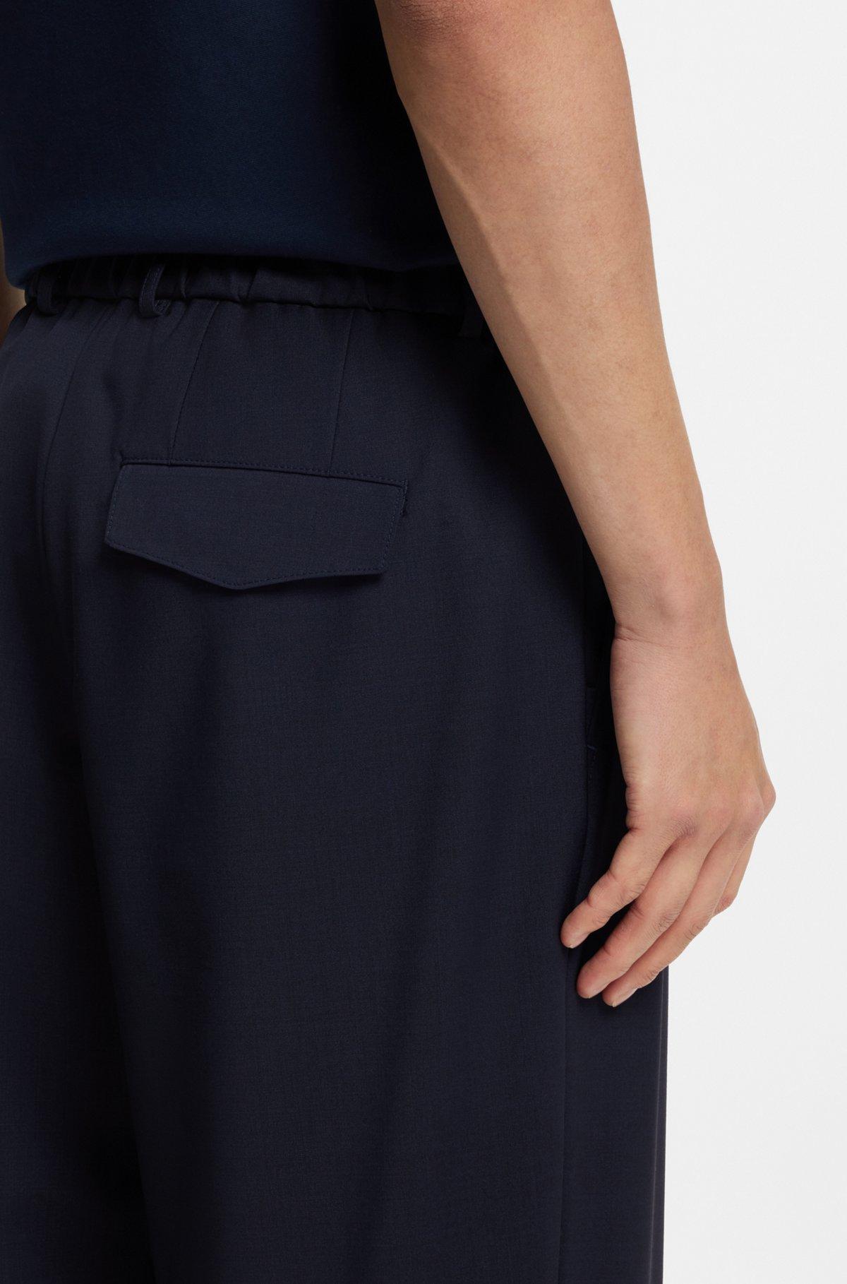 Washable tapered-fit trousers in a wool blend Product Image