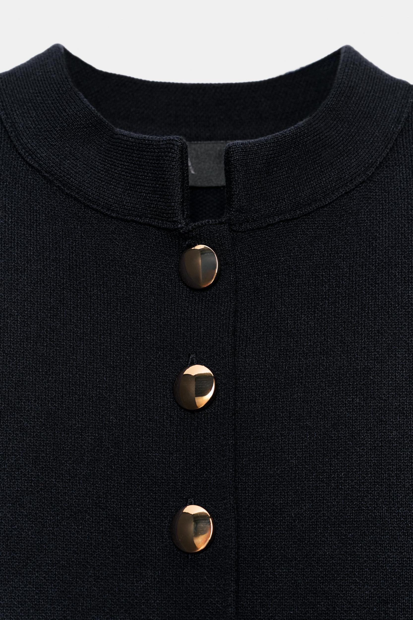 GOLD BUTTON PEPLUM CARDIGAN Product Image