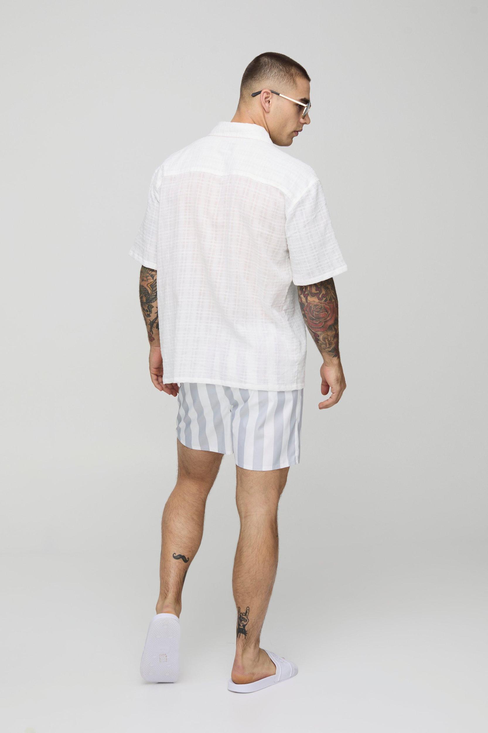 Wide Stripe Print Short Length Swim Trunks | boohooMAN USA Product Image