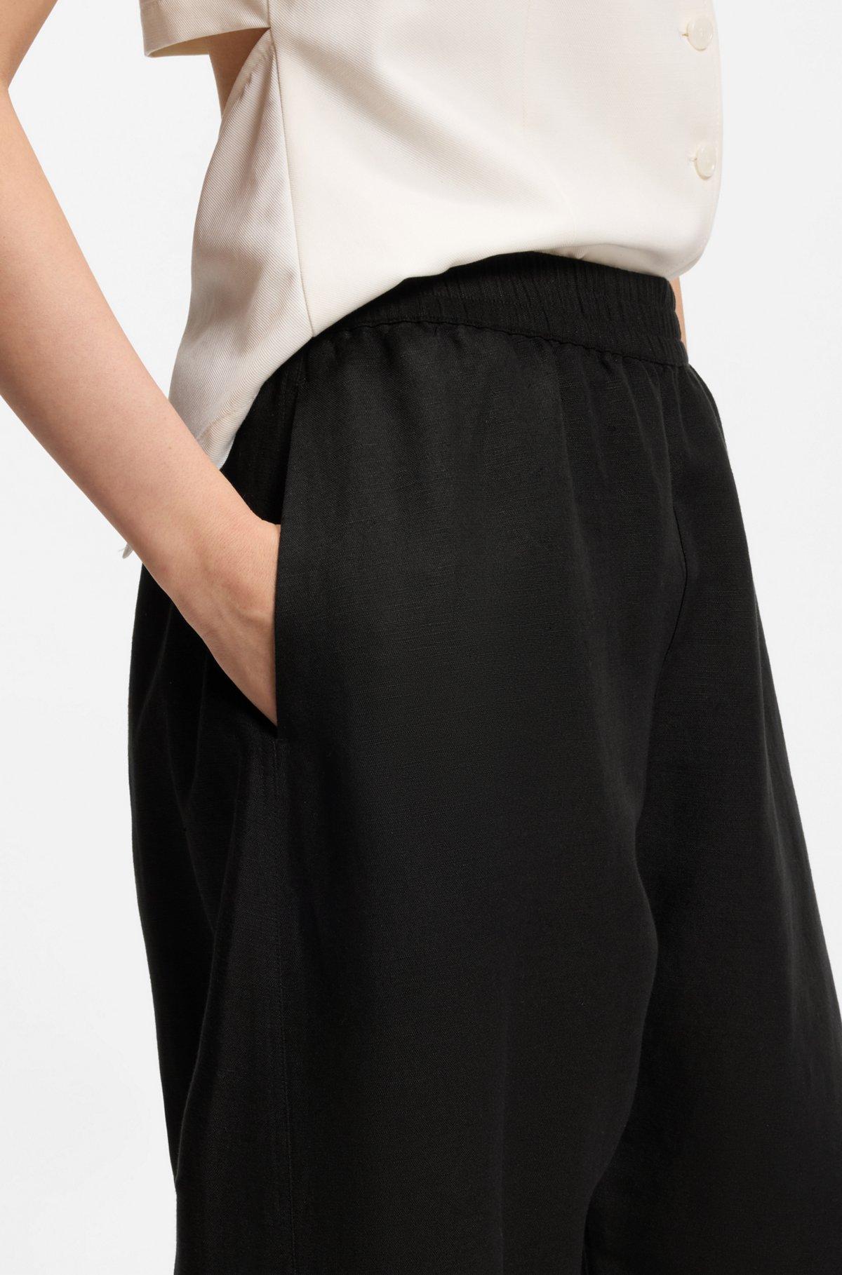 Balloon-leg trousers with elasticated waist Product Image