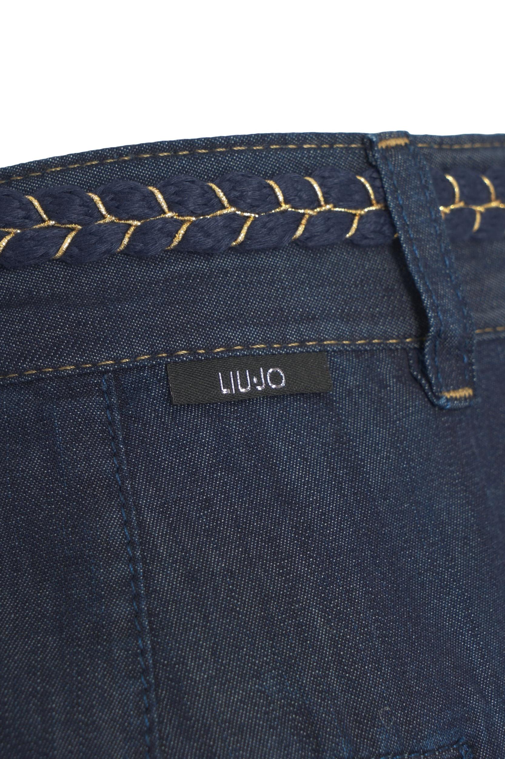 Flared pants with belt Product Image