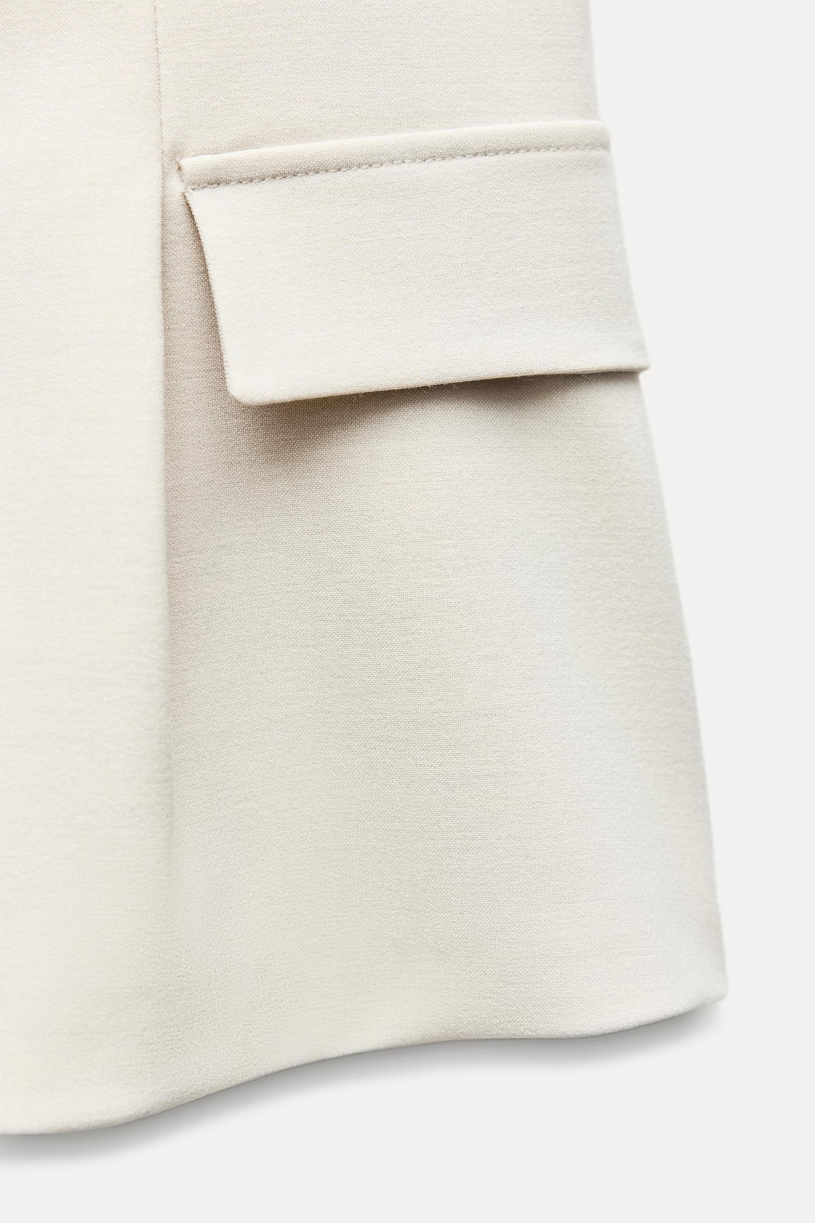 PEPLUM LAPELS TOP Product Image