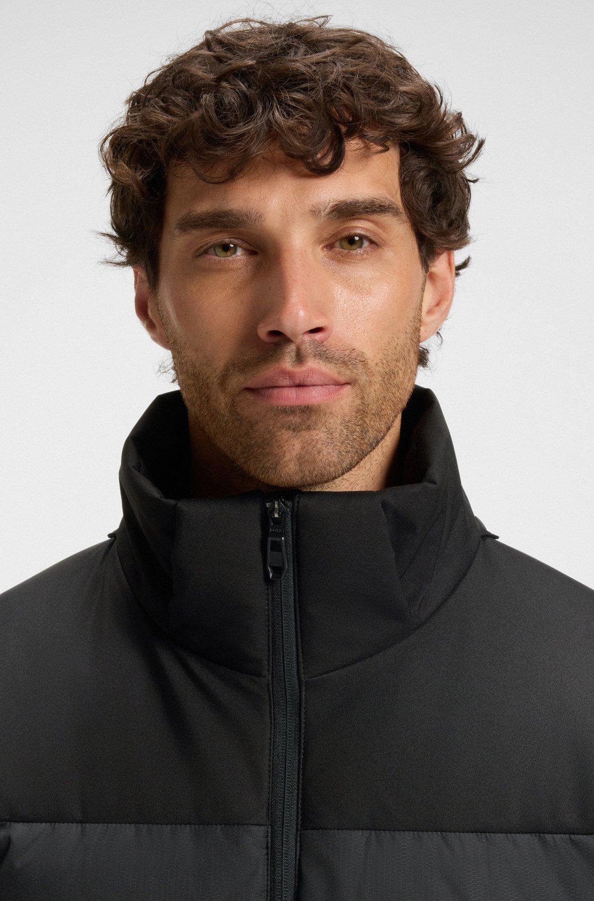 Water-repellent down jacket with detachable hood and sleeves Product Image