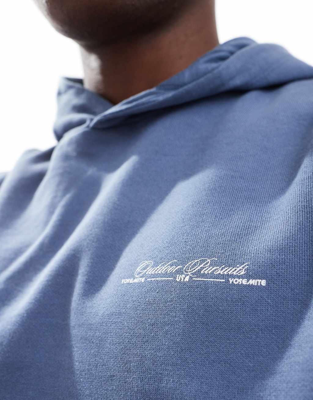 ASOS DESIGN boxy oversized hoodie with puff print in washed indigo Product Image