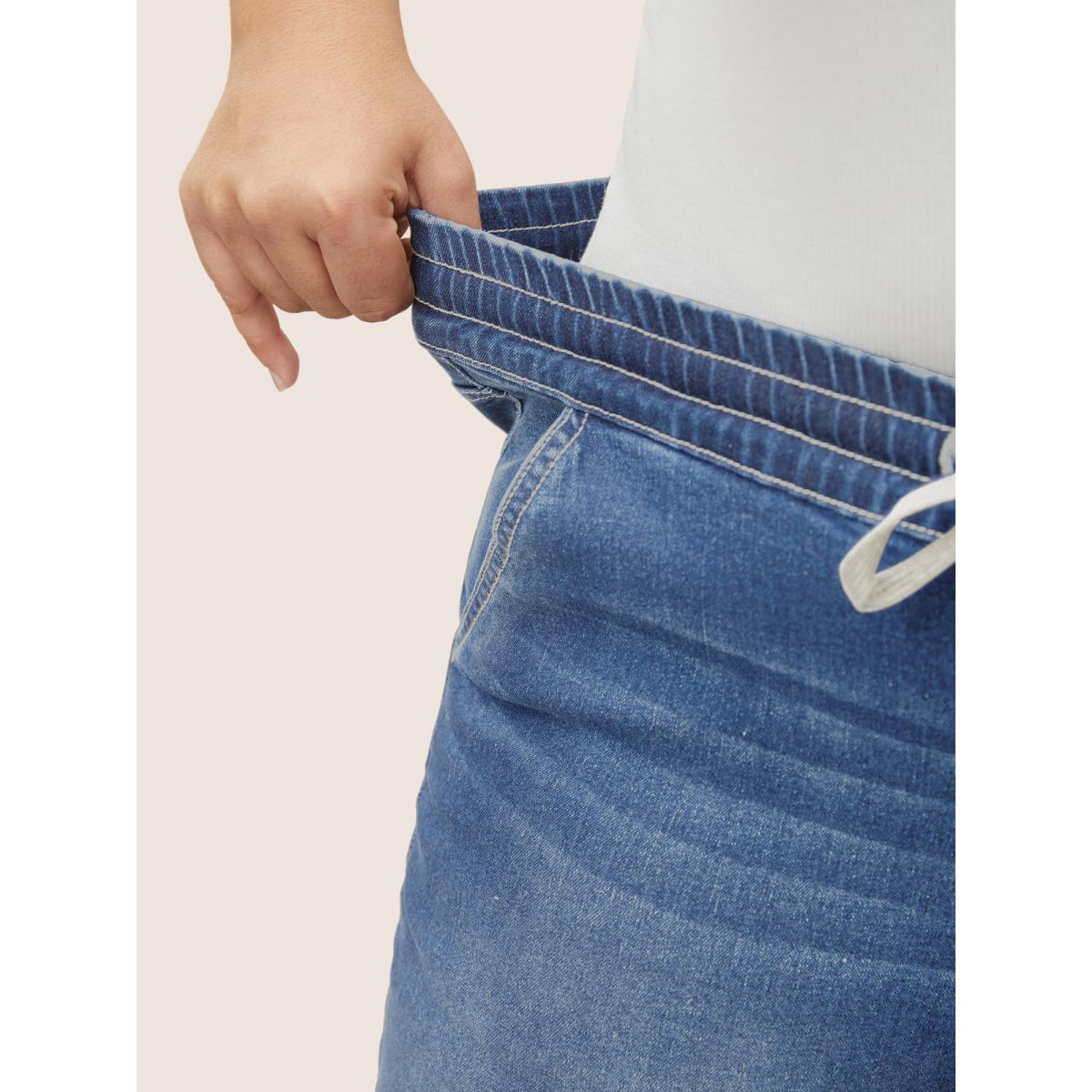 Plus Size Roll Hem Elastic Waist Drawstring Denim Shorts Women Denimlightblue Drawstring High stretch Everyday Slanted pocket Casual Denim Shorts BloomChic 20/2X Product Image