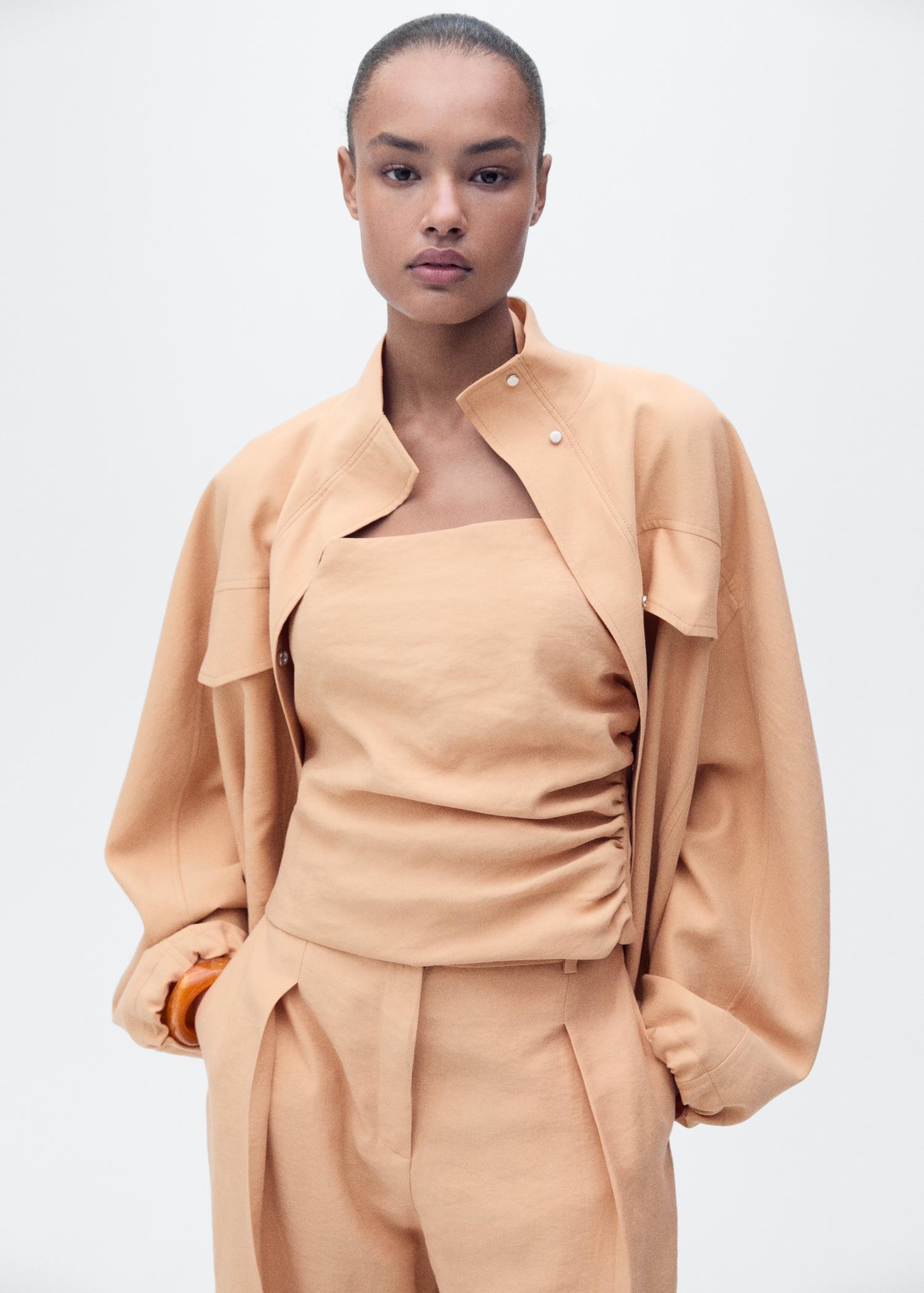 Straight-fit lyocell pants with pleats - Women | MANGO USA Product Image