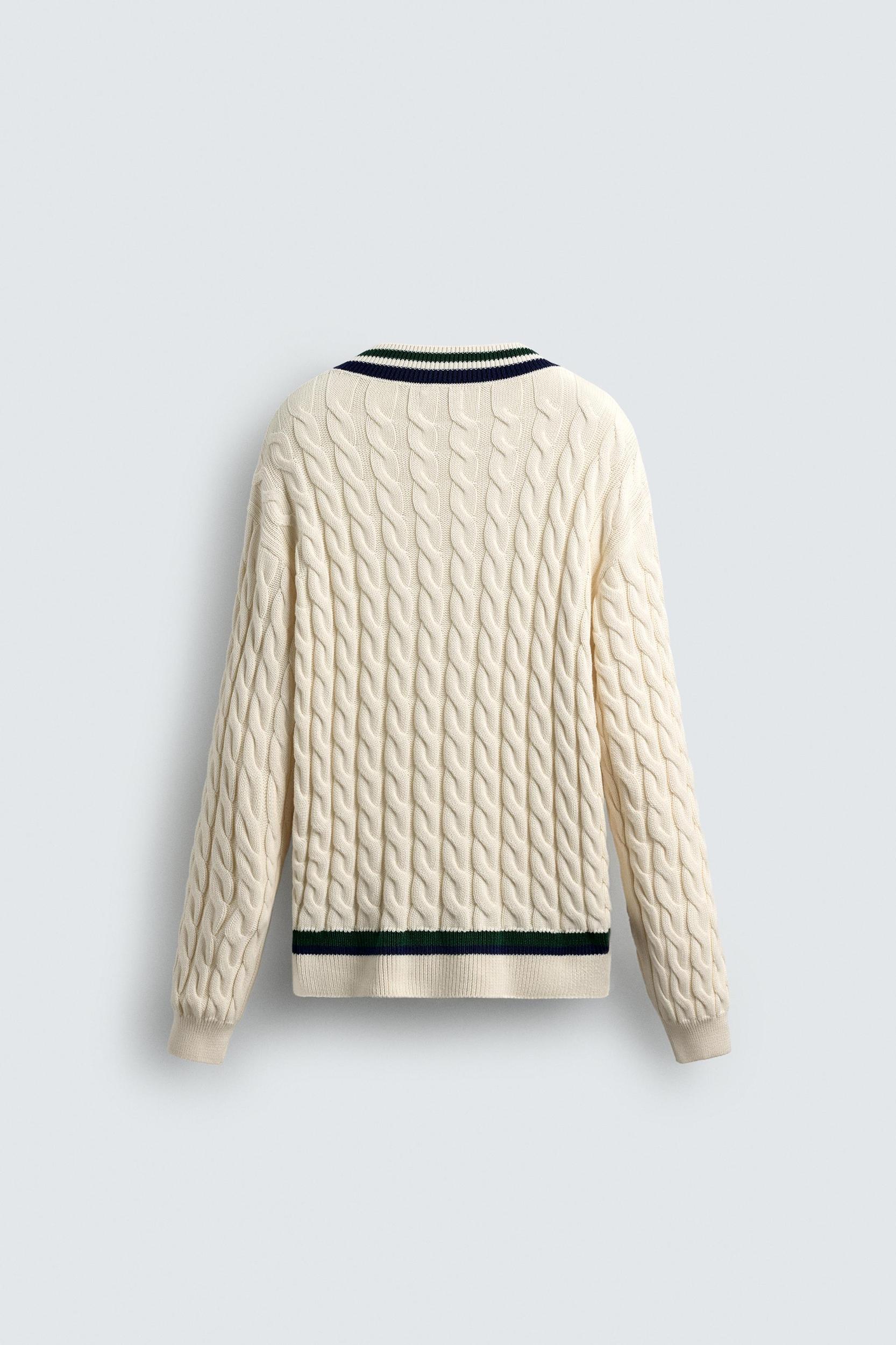 CABLE KNIT SWEATER Product Image