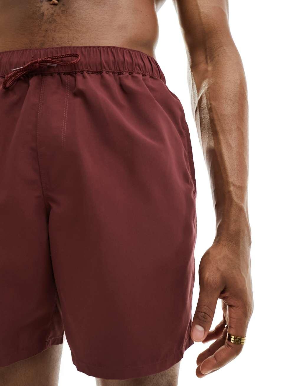 ASOS DESIGN swim shorts in mid length in burgundy Product Image
