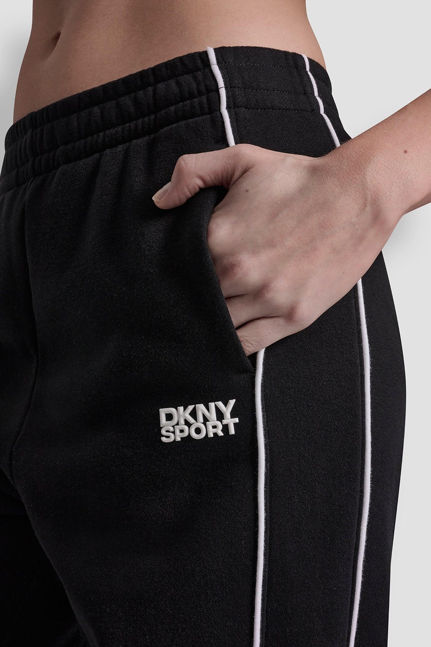 HIGH-RISE PIPED TRACK PANTS Product Image