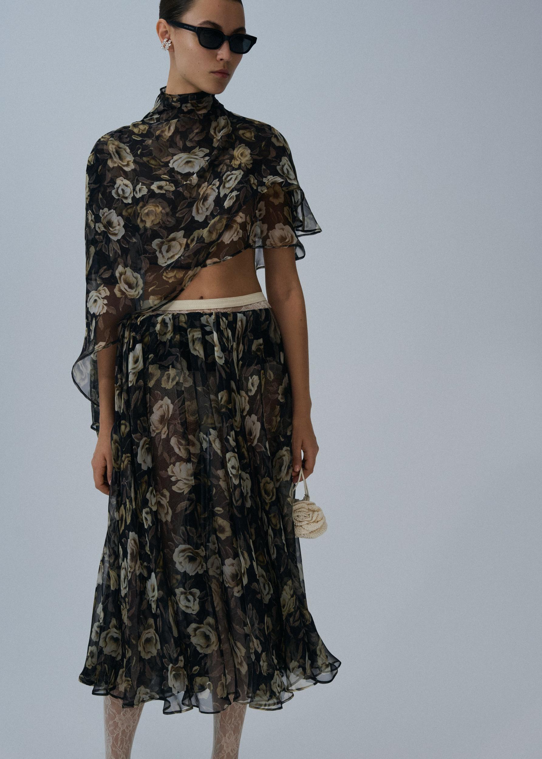 Sheer midi skirt in black print Product Image