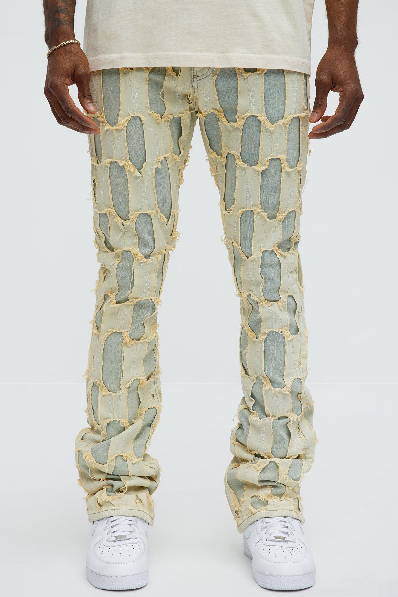 Shredded Distressed Stacked Skinny Flare Jeans - Medium Wash Product Image