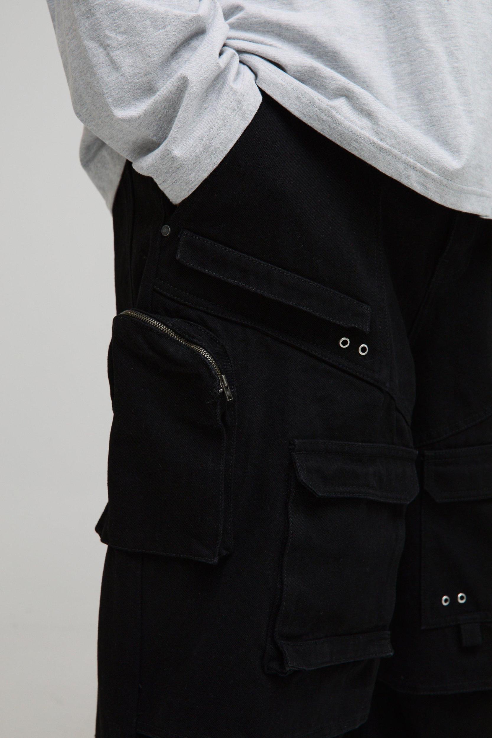 Plus Extreme Cargo Eyelet Detail Baggy Jeans | boohooMAN USA Product Image