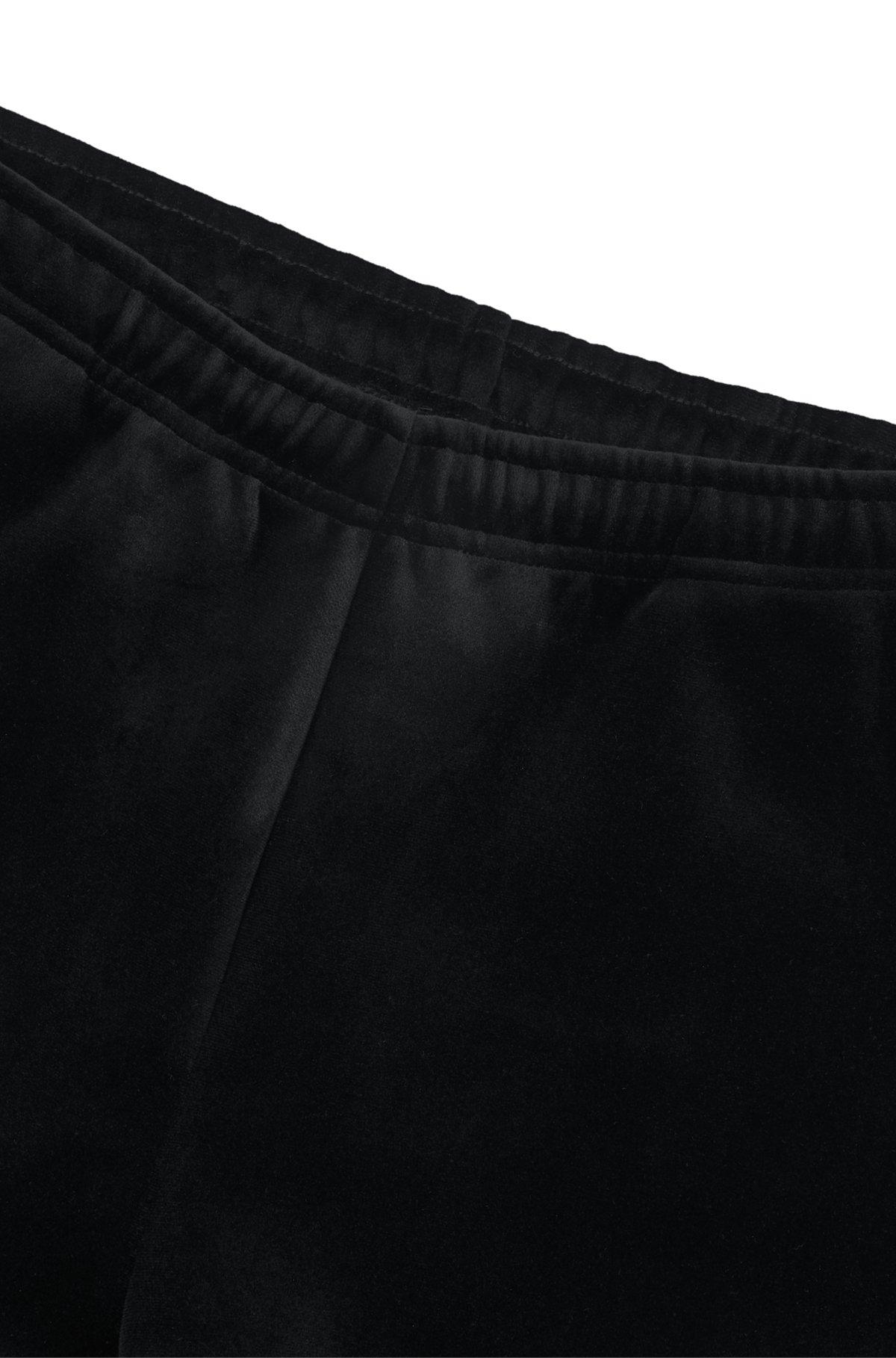 Relaxed-fit tracksuit bottoms in stretch velour Product Image