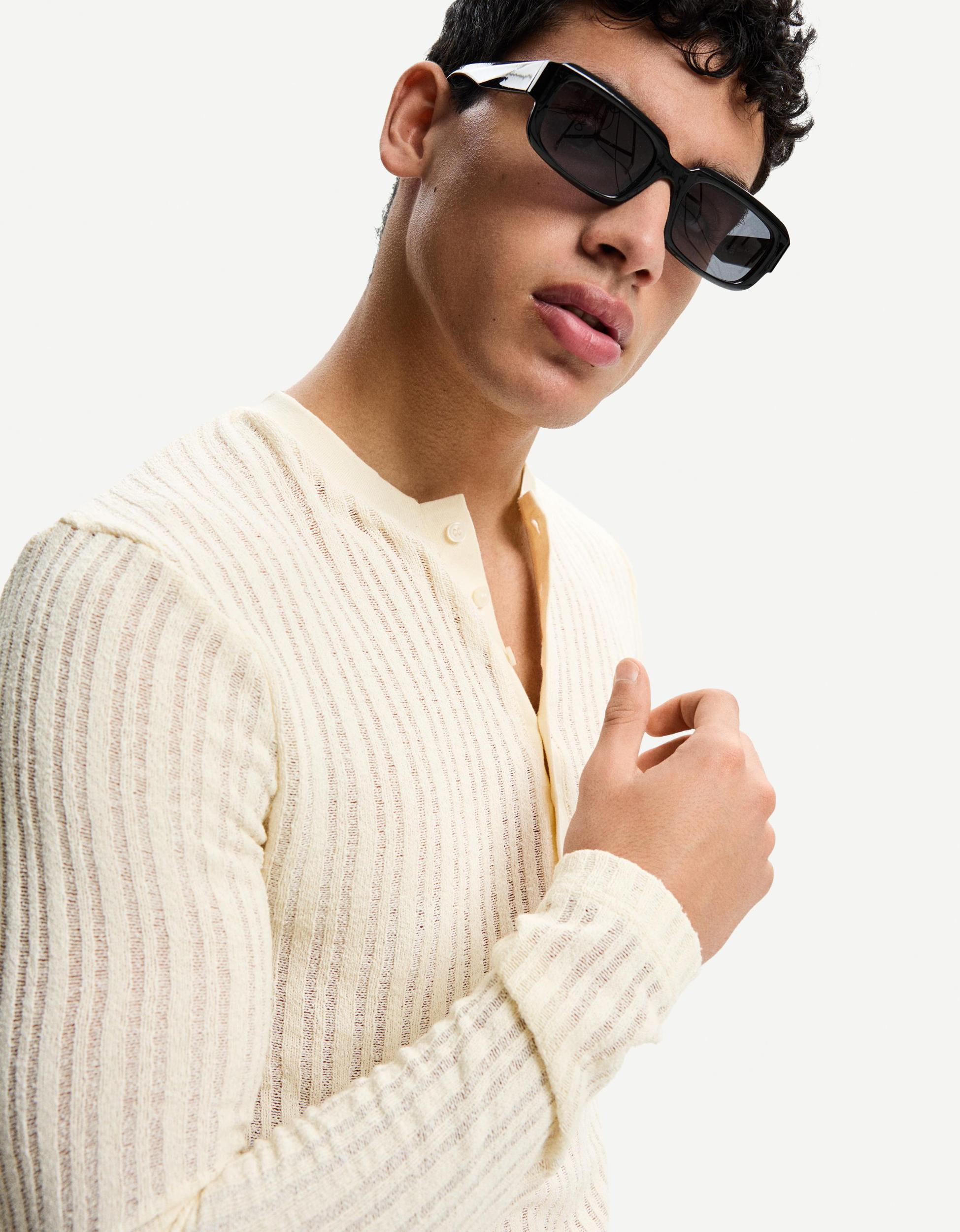 Open knit sweater with buttons Product Image