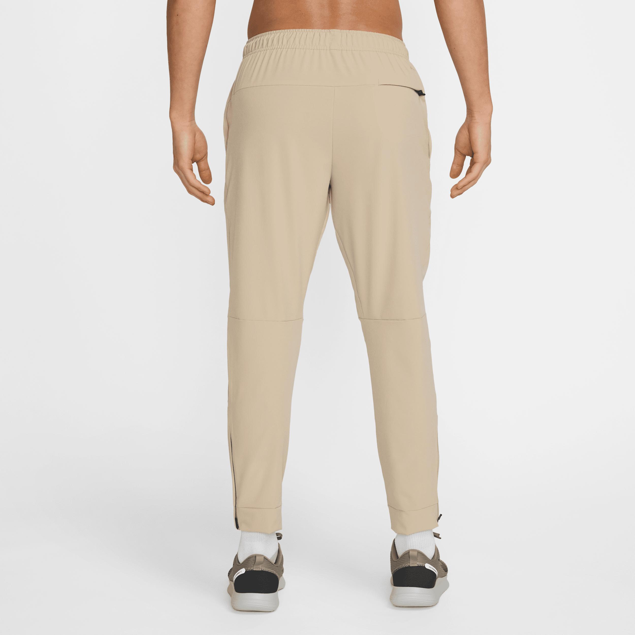 Nike Mens Unlimited Dri-FIT Zippered Cuff Versatile Pants | FB7548-320 Product Image