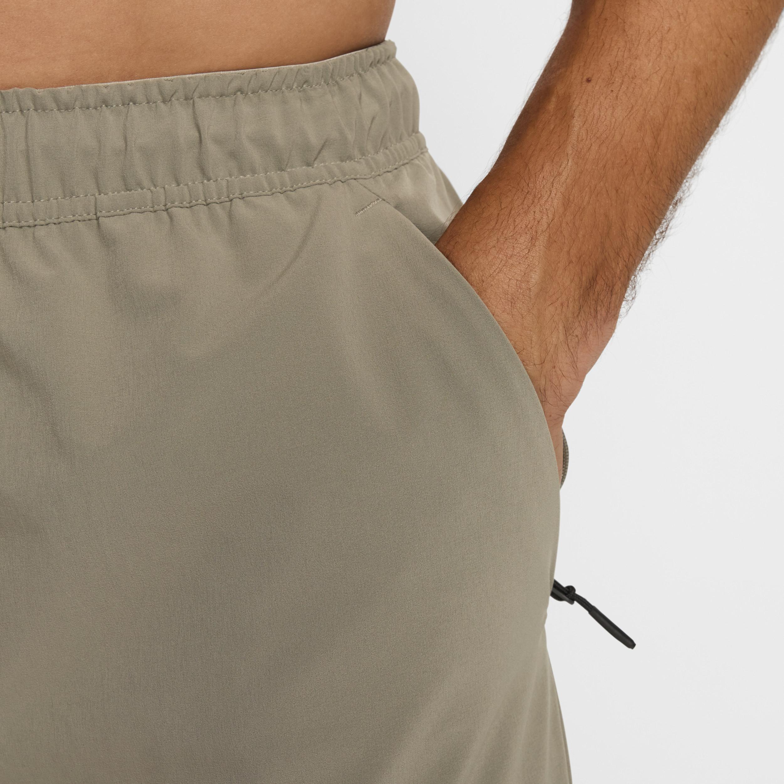 Nike Mens Unlimited Dri-FIT Zippered Cuff Versatile Pants | FB7548-320 Product Image