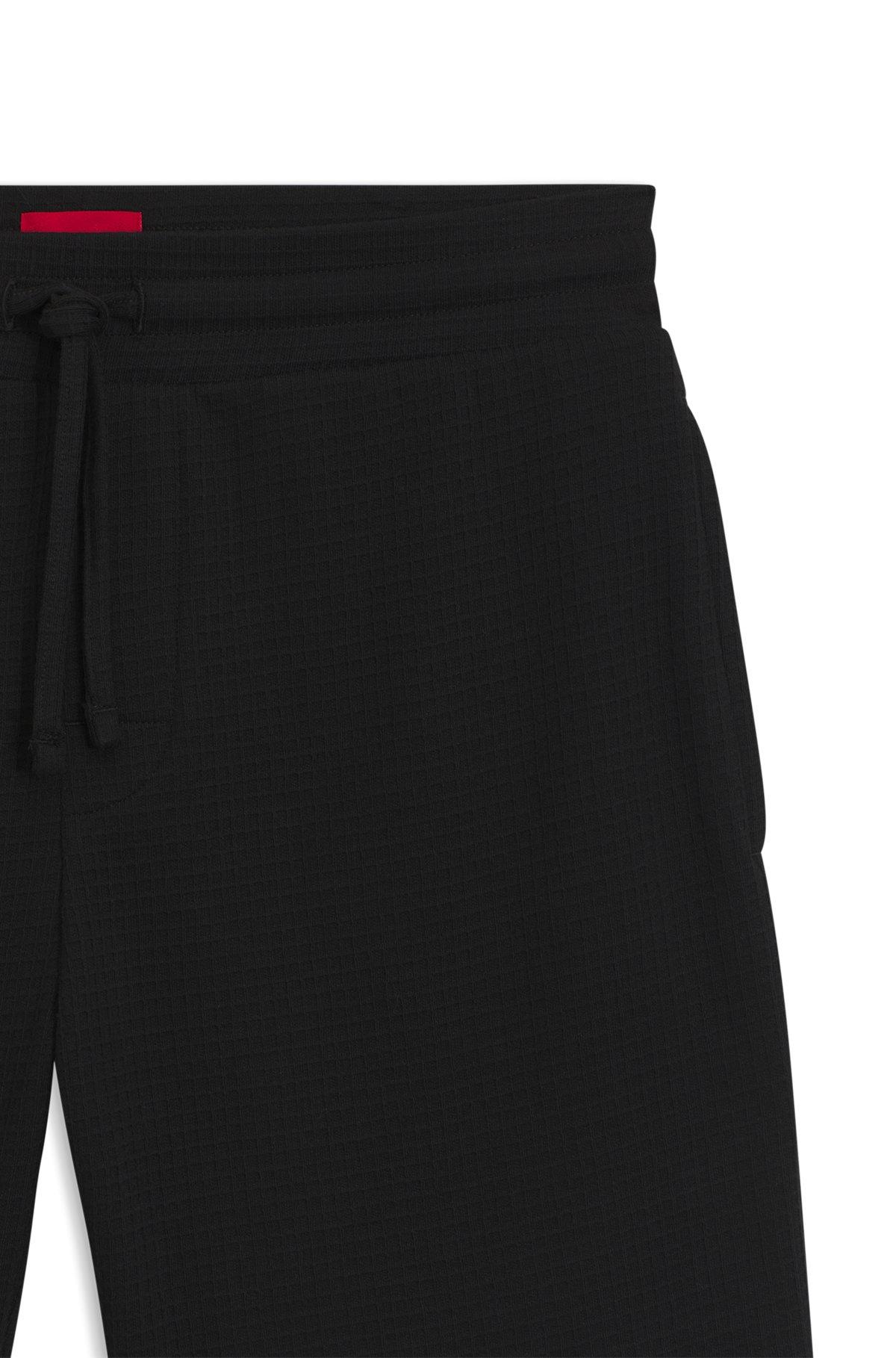 Waffle-structured pajama shorts with embroidered logo Product Image