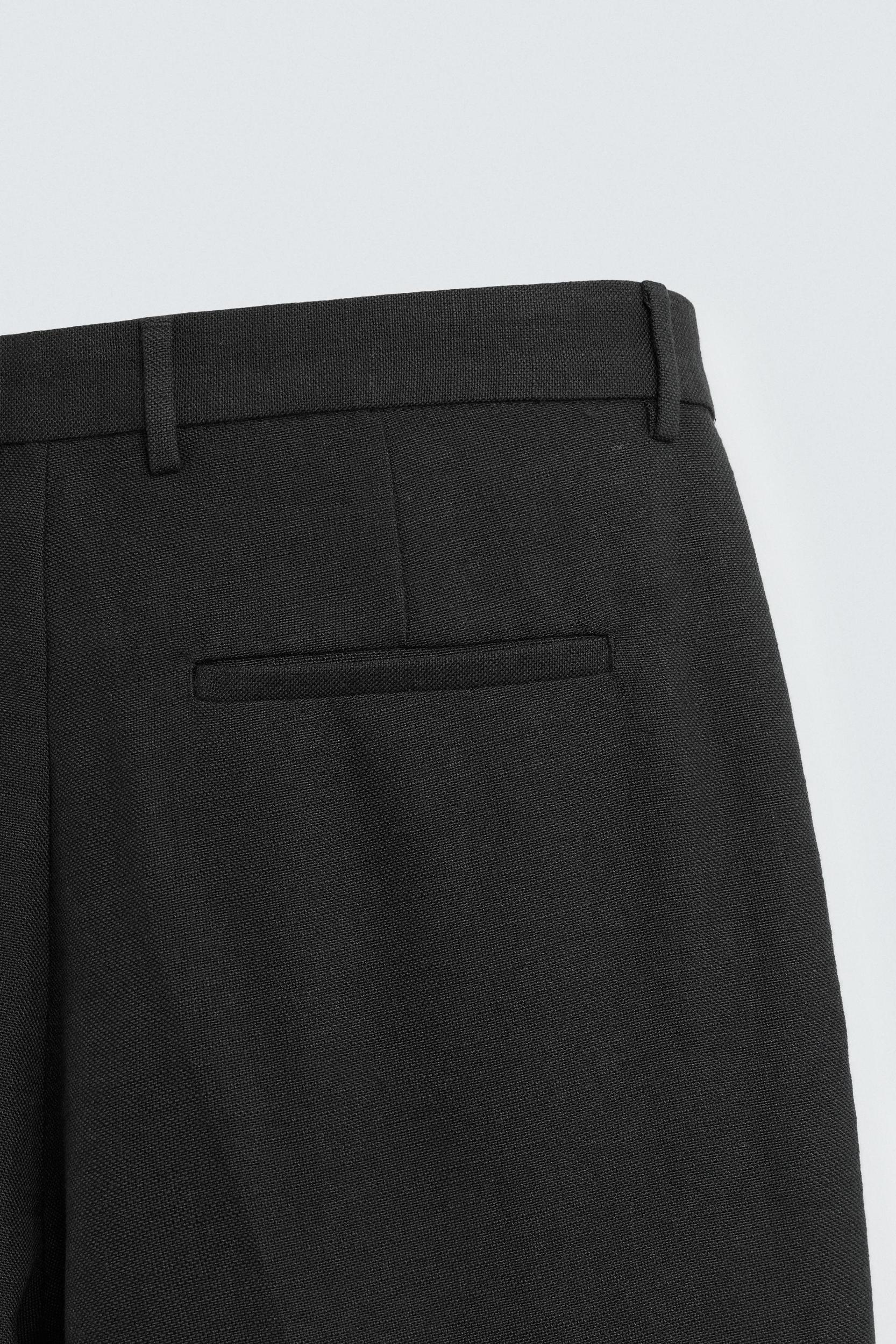 PLEATED RELAXED FIT PANTS Product Image