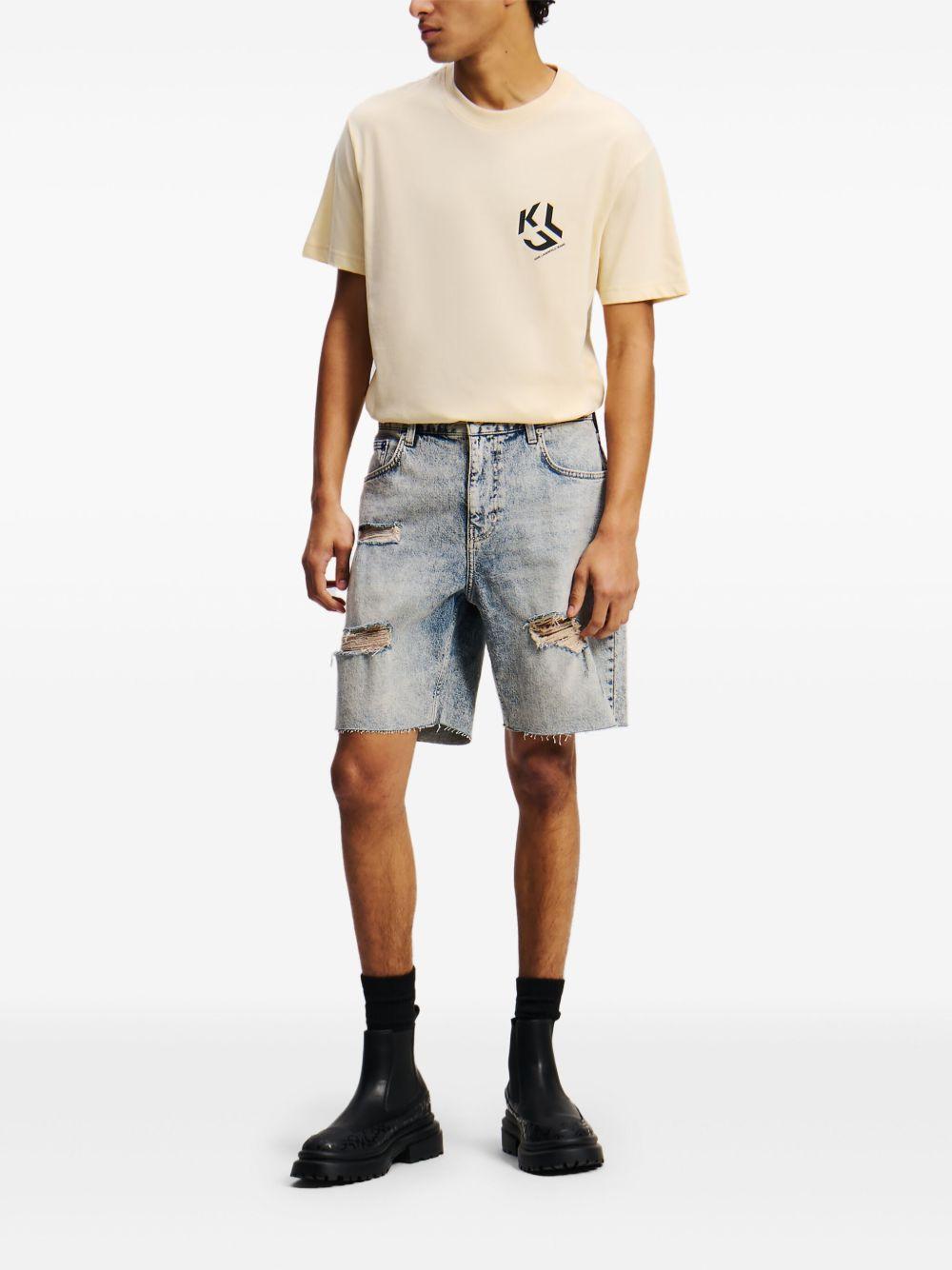 distressed relaxed denim shorts Product Image