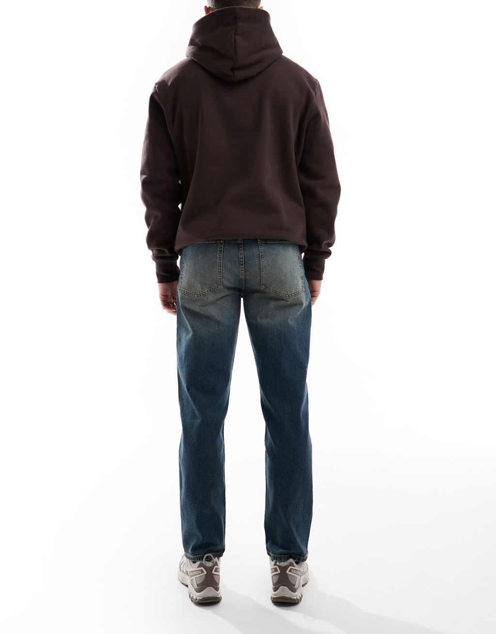 ASOS DESIGN straight leg stretch jeans with tint in dark wash blue Product Image