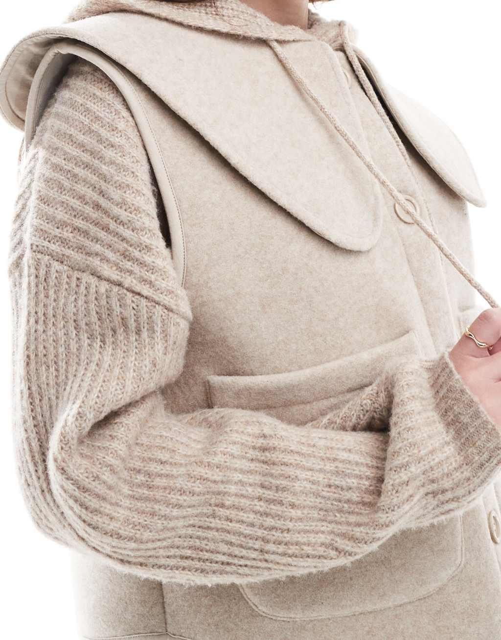 ASOS DESIGN sleeveless peter pan collared button through vest Product Image