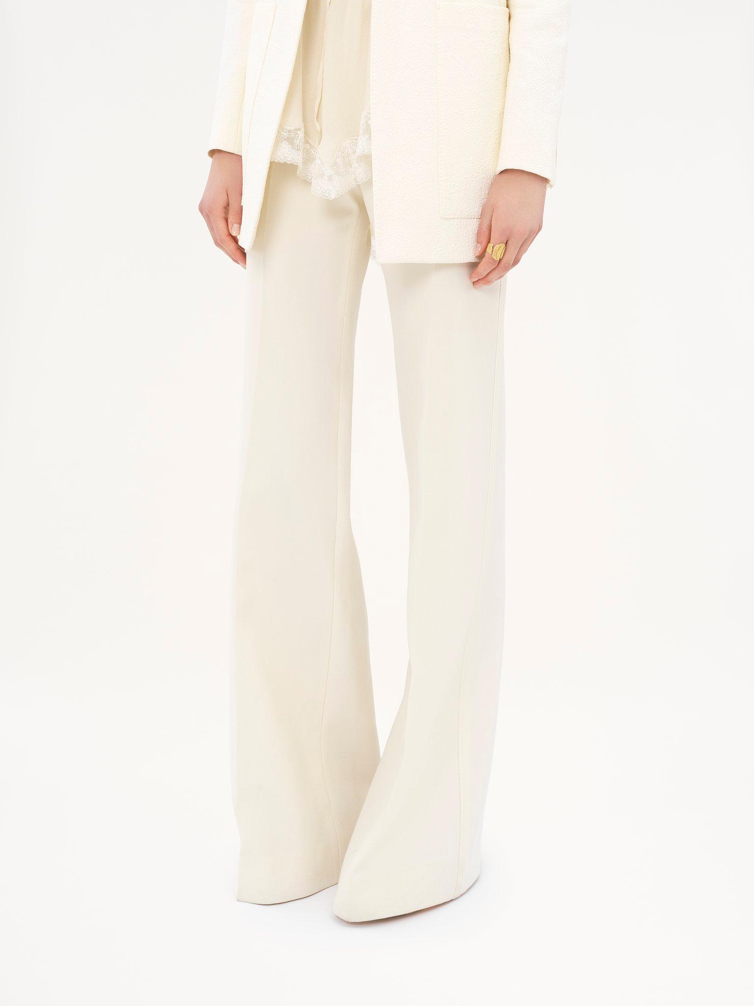 High-rise flared pants in wool grain de poudre Product Image