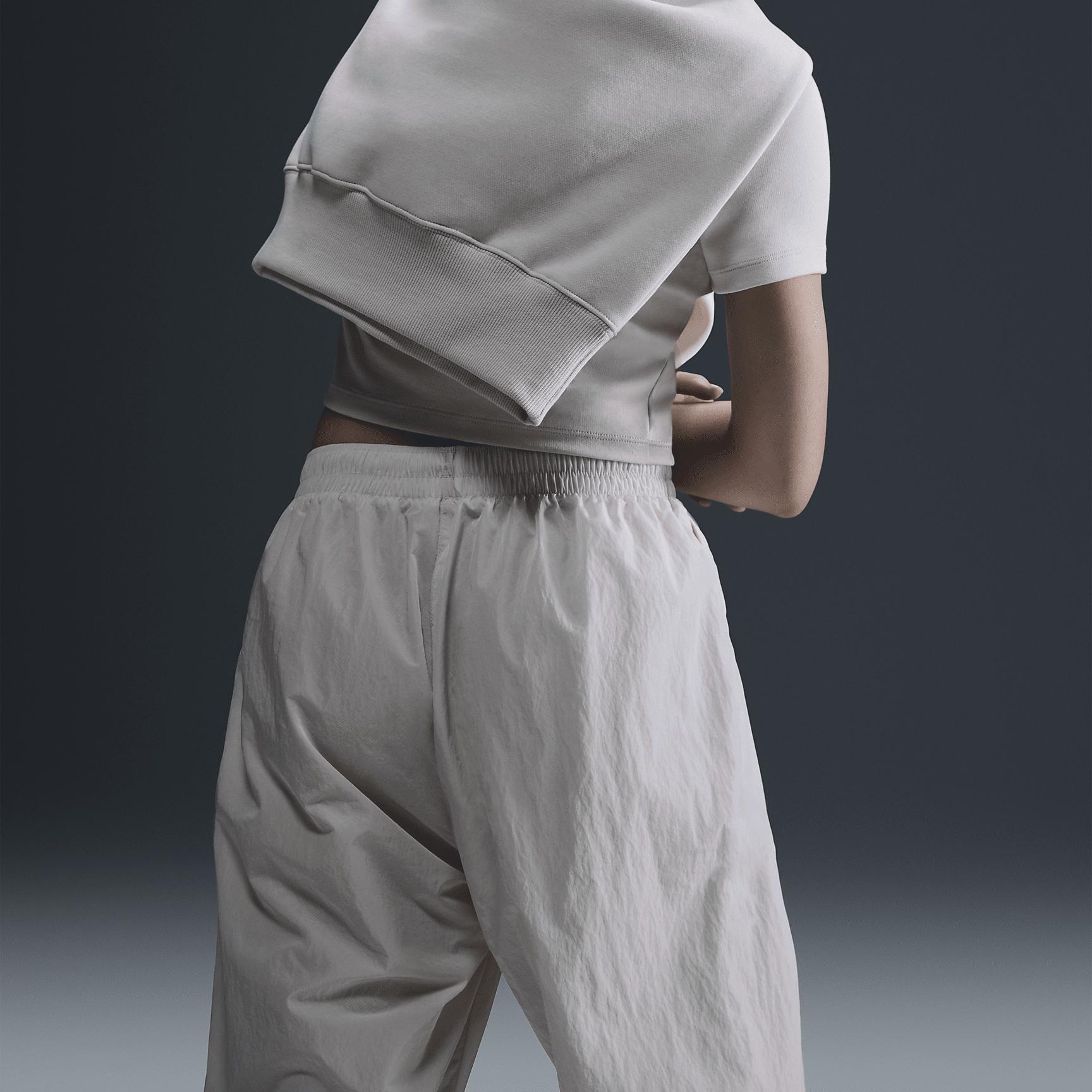 Women's Nike Sportswear Essential Mid-Rise Oversized Woven Jogger Pants Product Image