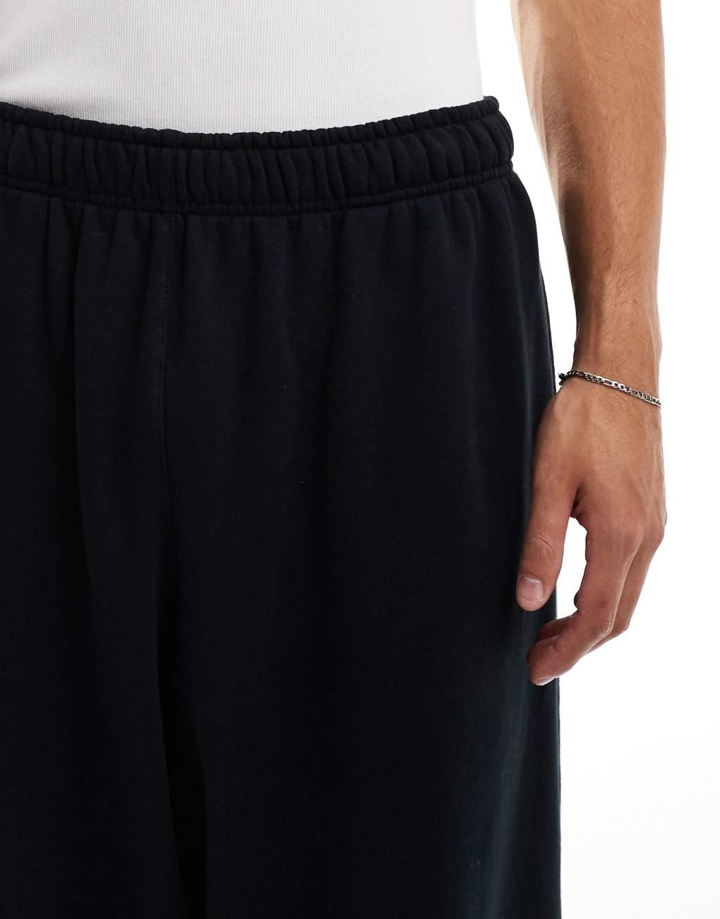 Nike Club french terry oversized joggers in black Product Image