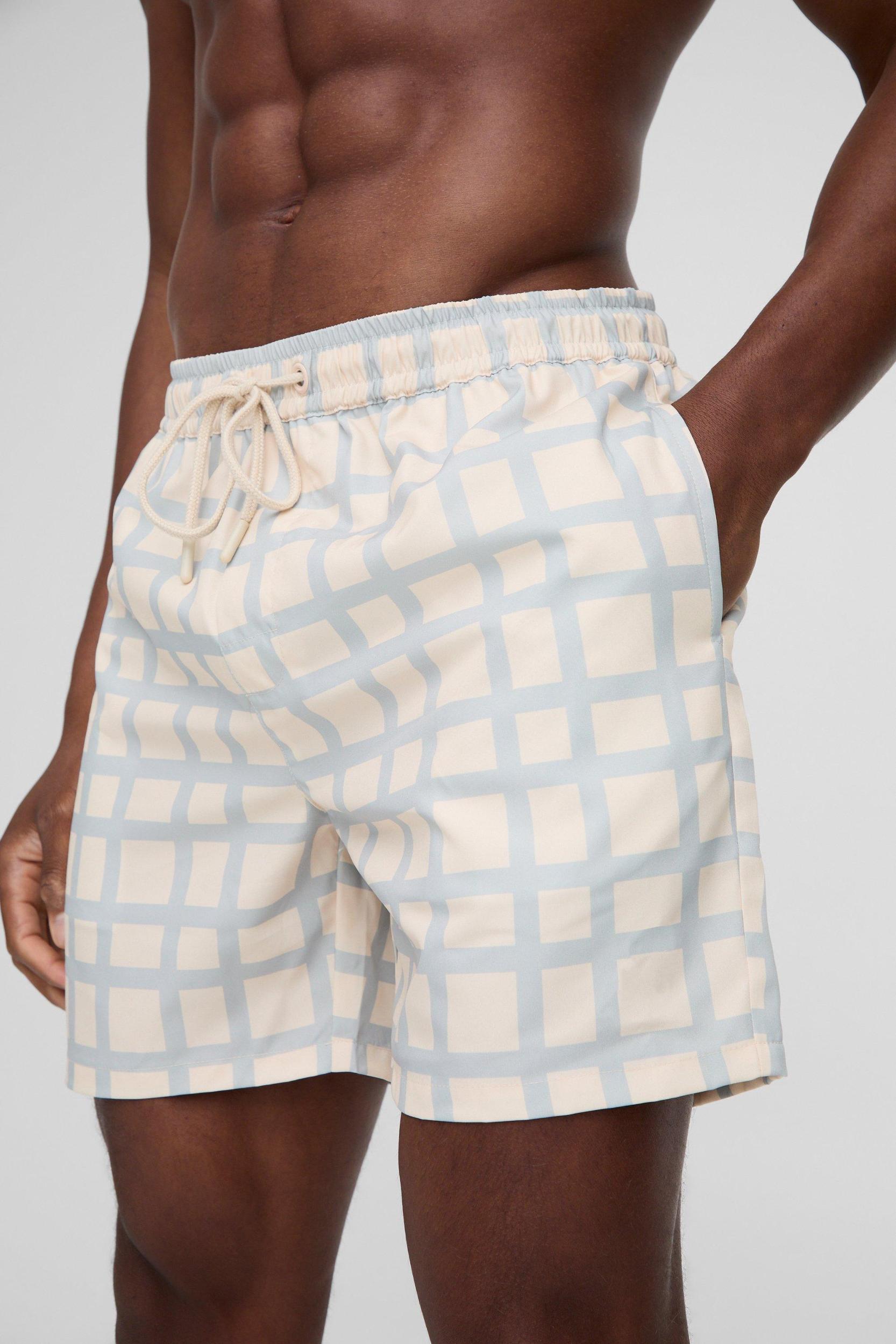 Mid Length Plaid Swim Trunks | boohooMAN USA Product Image