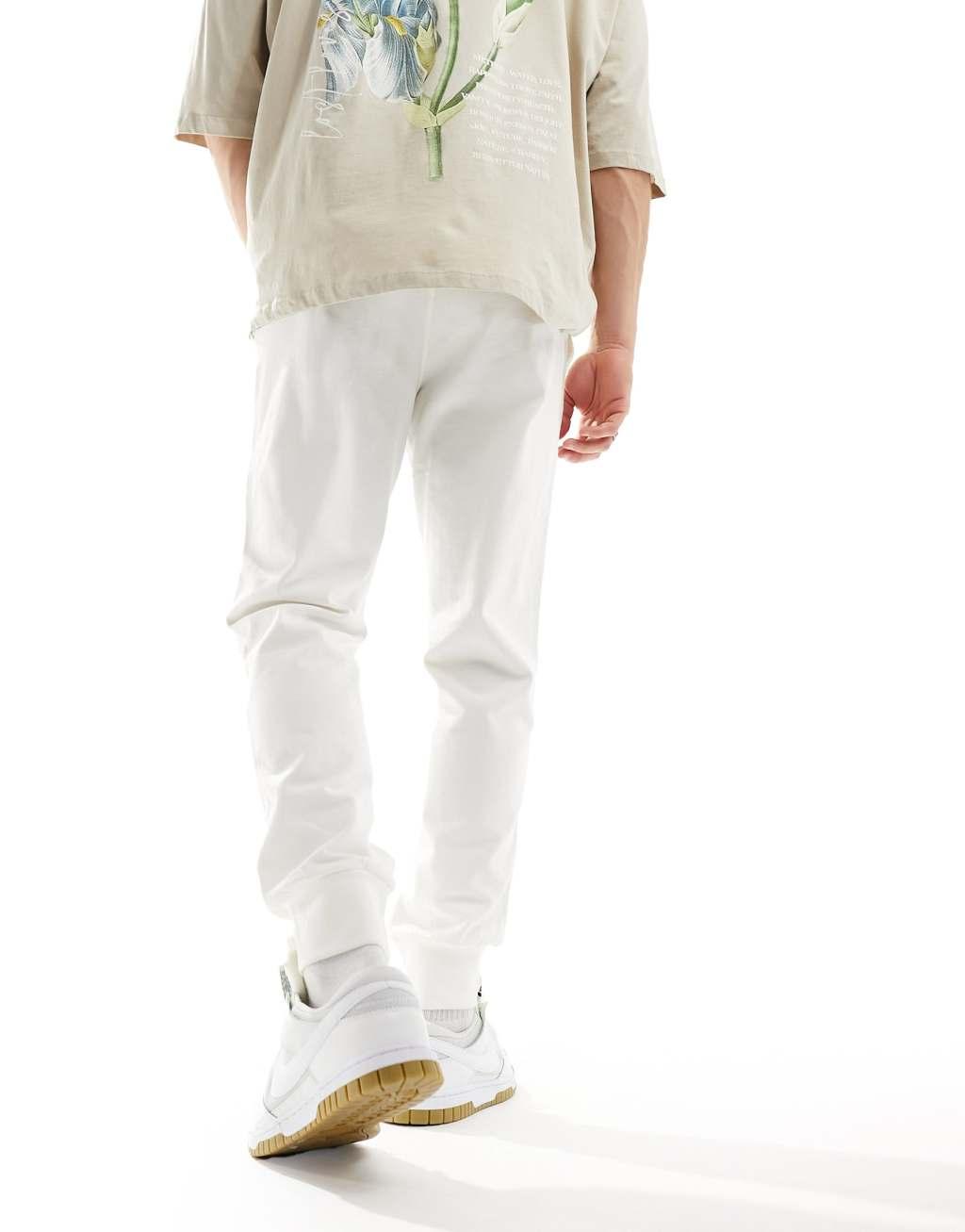 Nike Club Knit sweatpants in off white  Product Image
