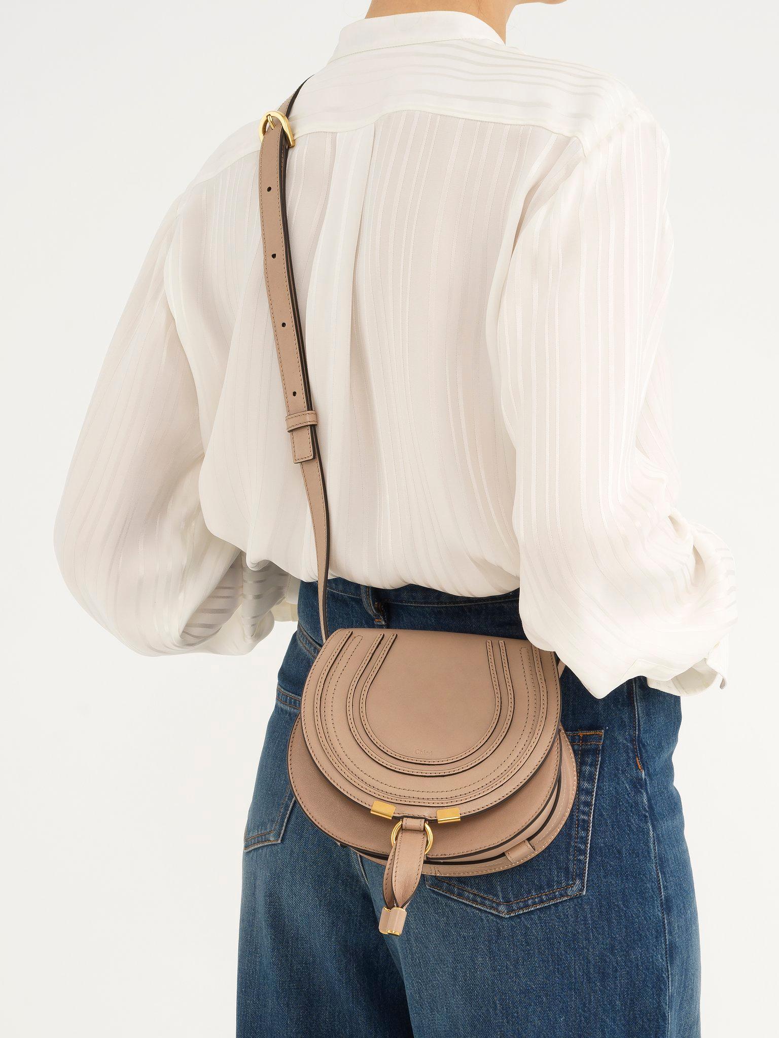 Small Marcie saddle bag in shiny leather Product Image