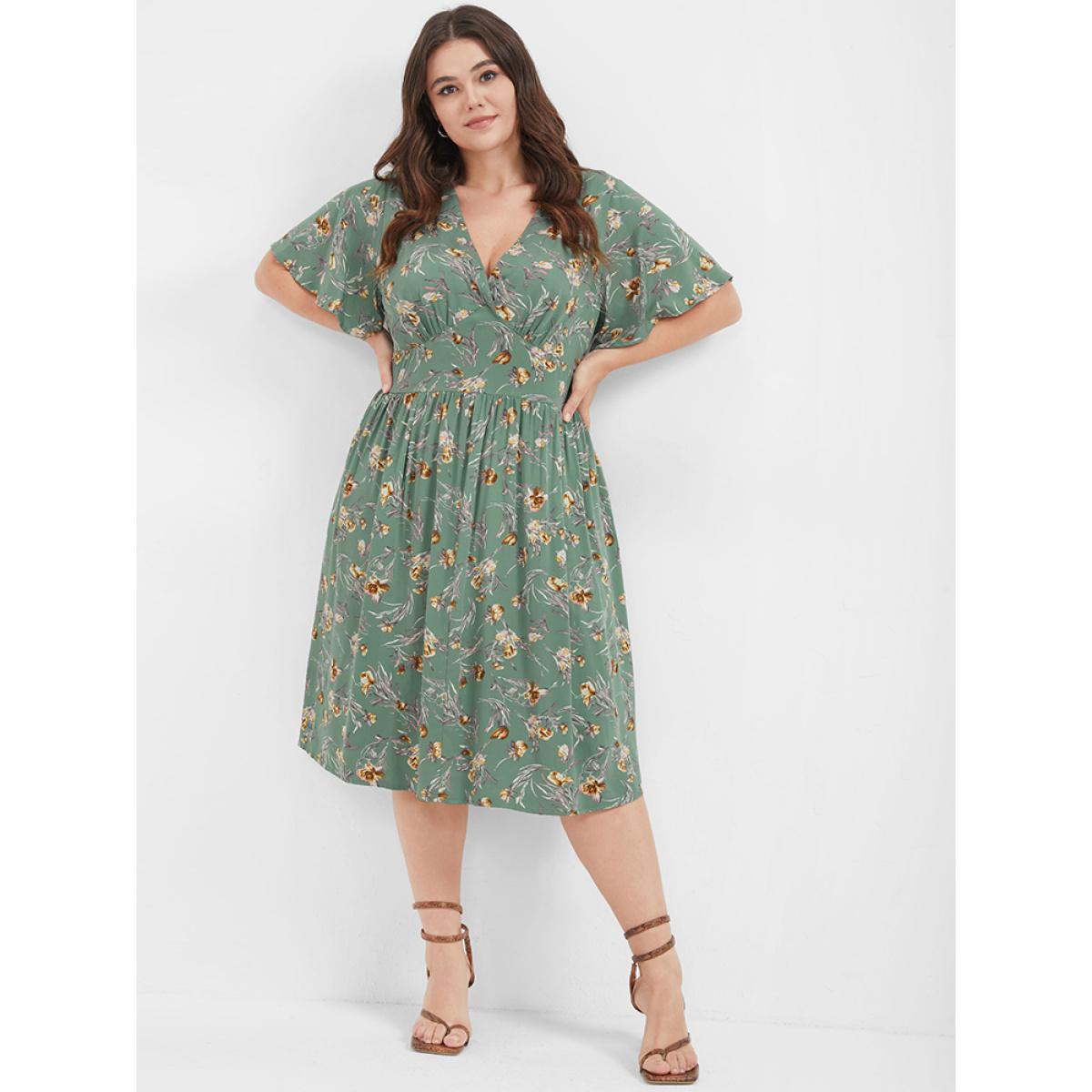 Plus Size Bloom Dress - Floral Flutter Shirred Pocket V Neck Dress Green Women Casual Gathered V-neck Short sleeve Curvy Midi Dress BloomChic 14-16/1X Product Image