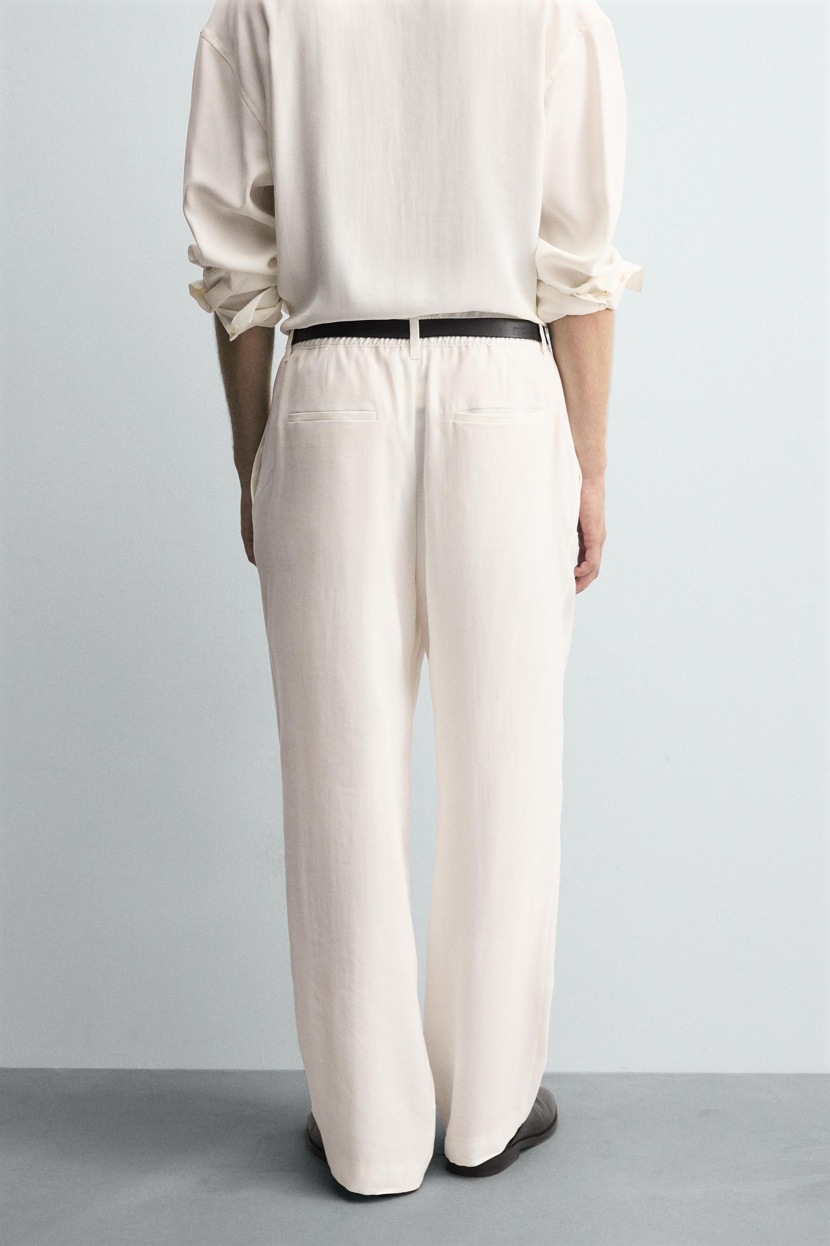RELAXED FIT PLEATED PANTS Product Image