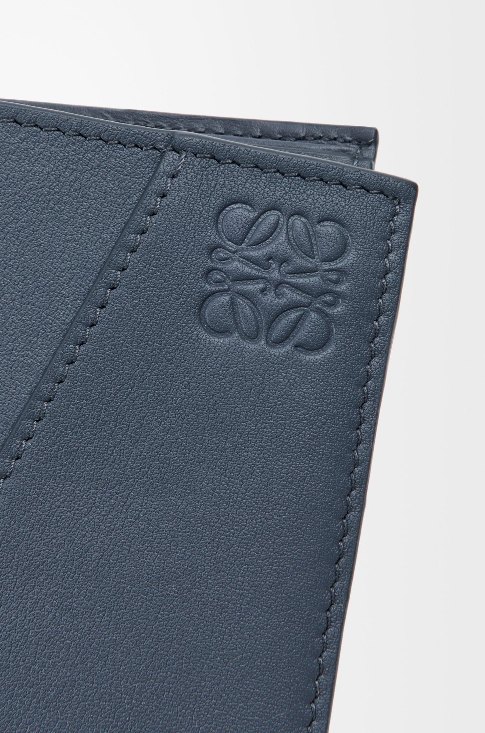 Puzzle bifold wallet in classic calfskin Product Image