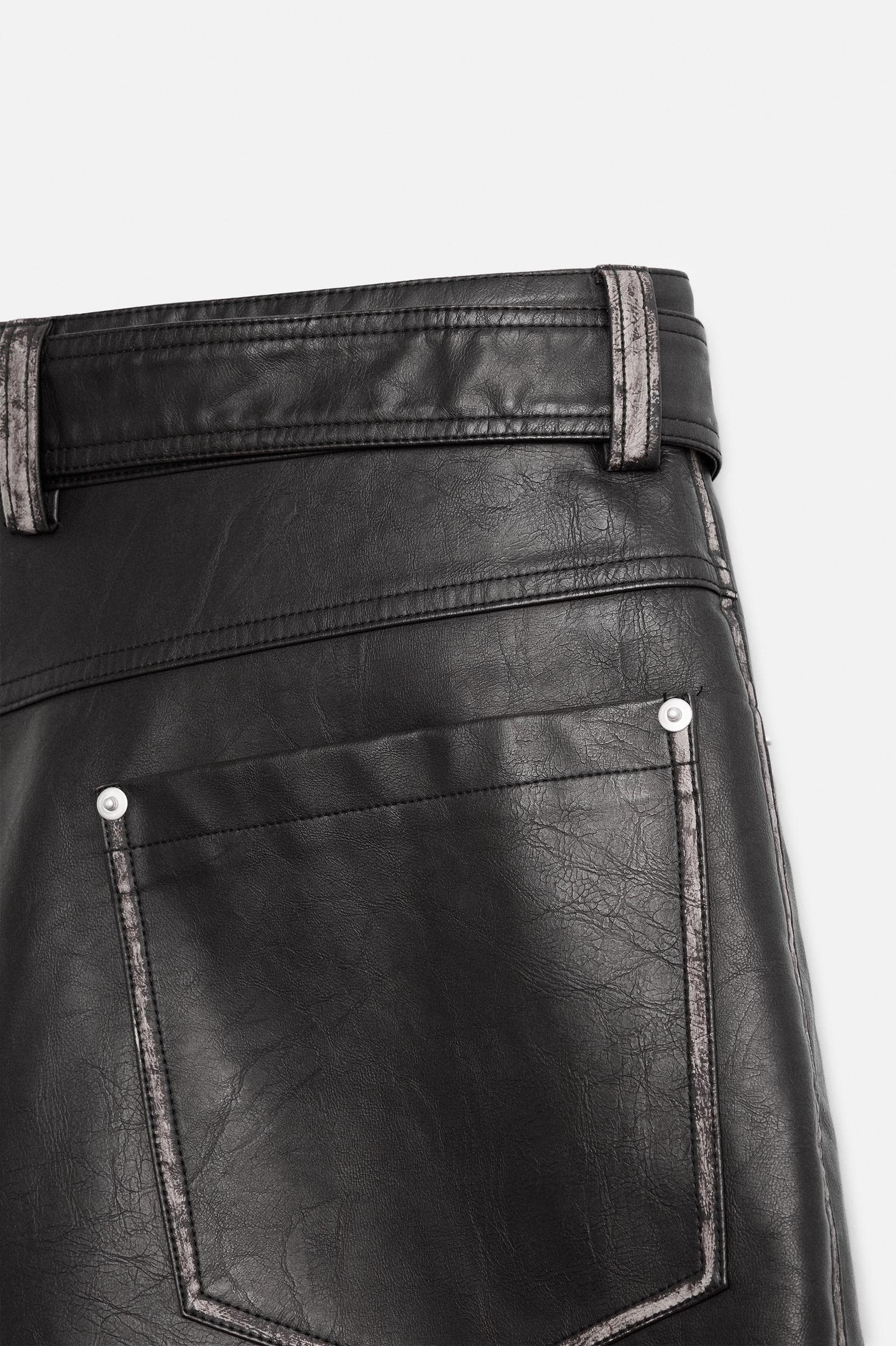 FAUX LEATHER BELTED SHORTS Product Image