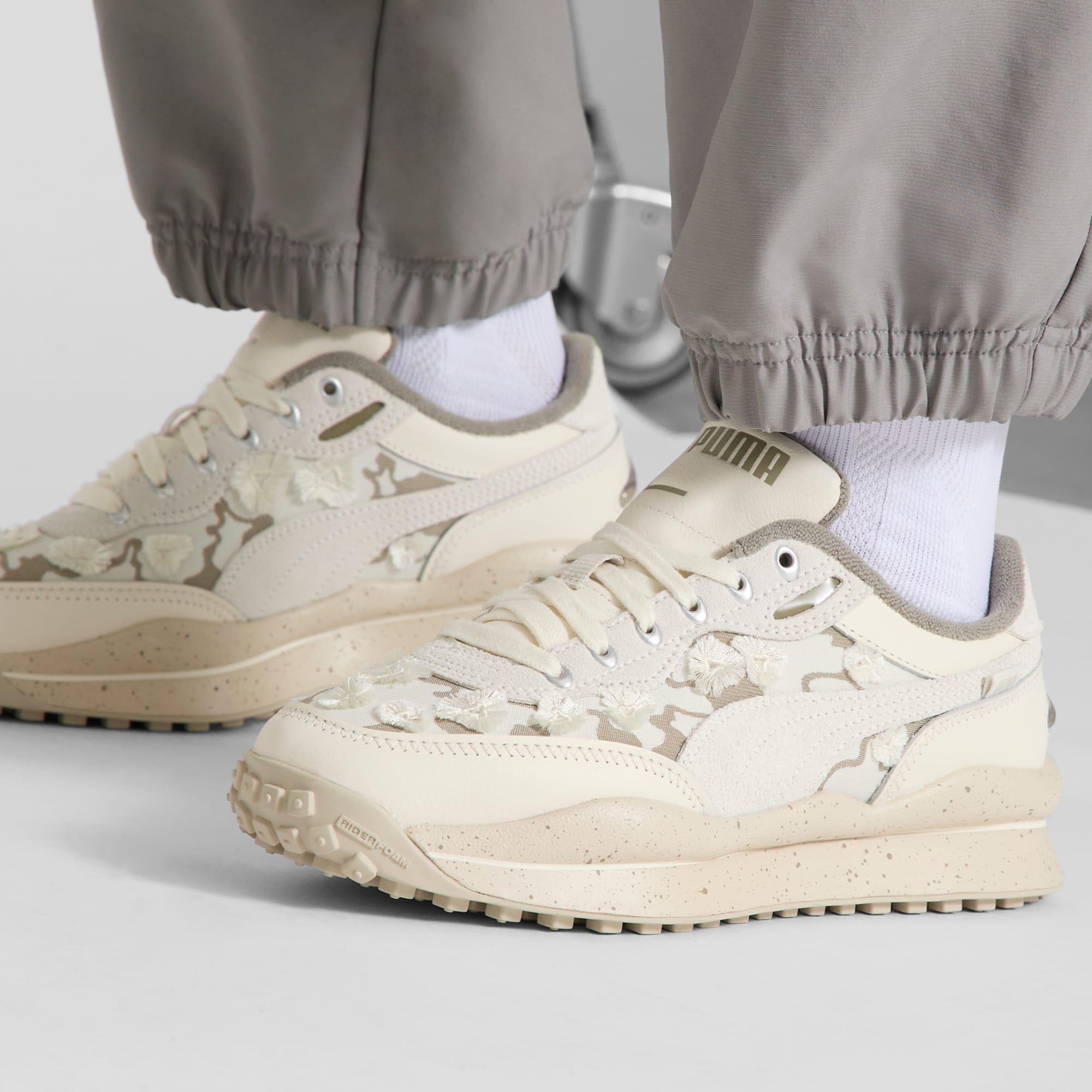 Style Rider Trim Women's Sneakers Product Image