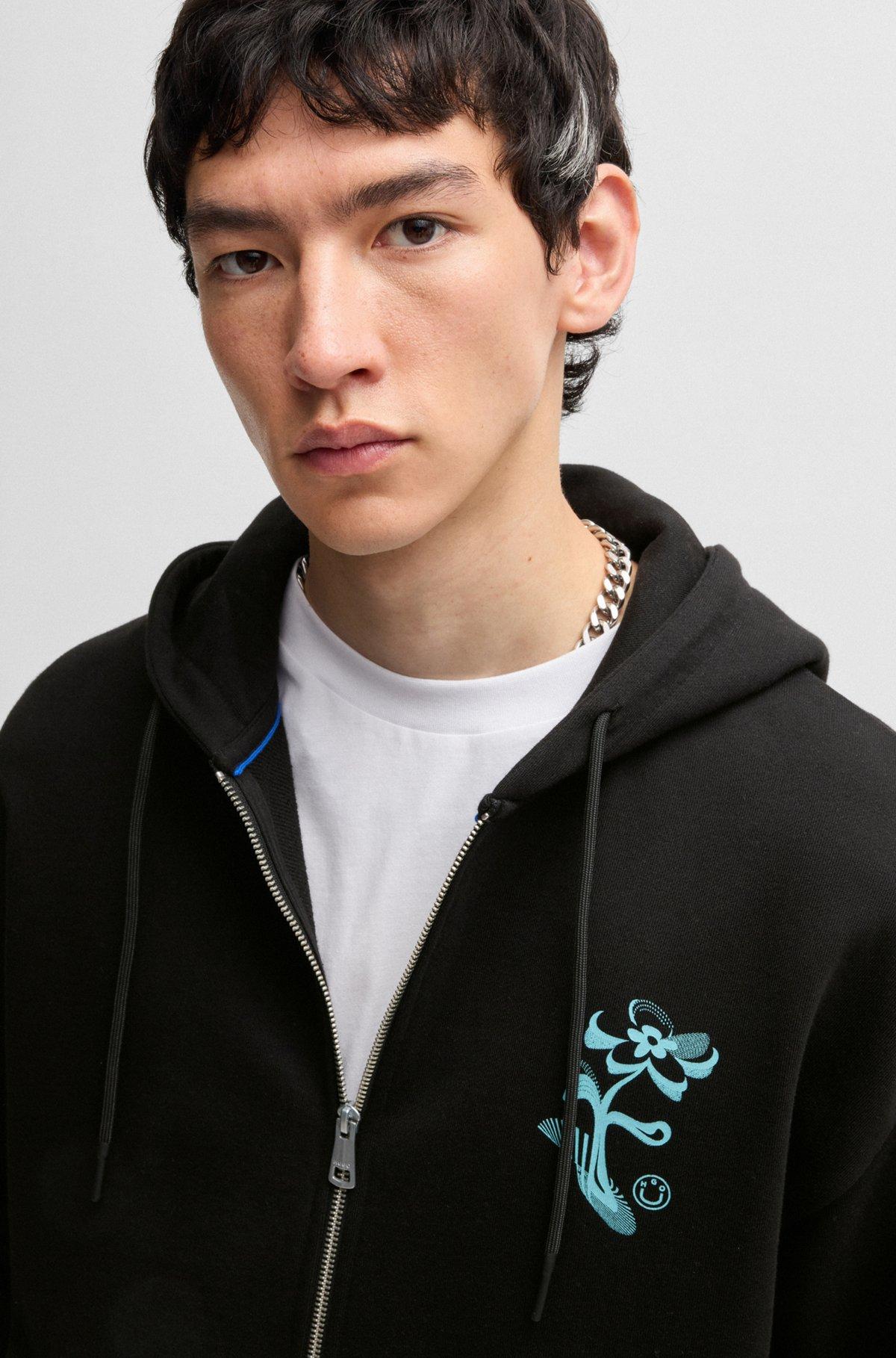 Cotton-terry zip-up hoodie with seasonal artwork Product Image