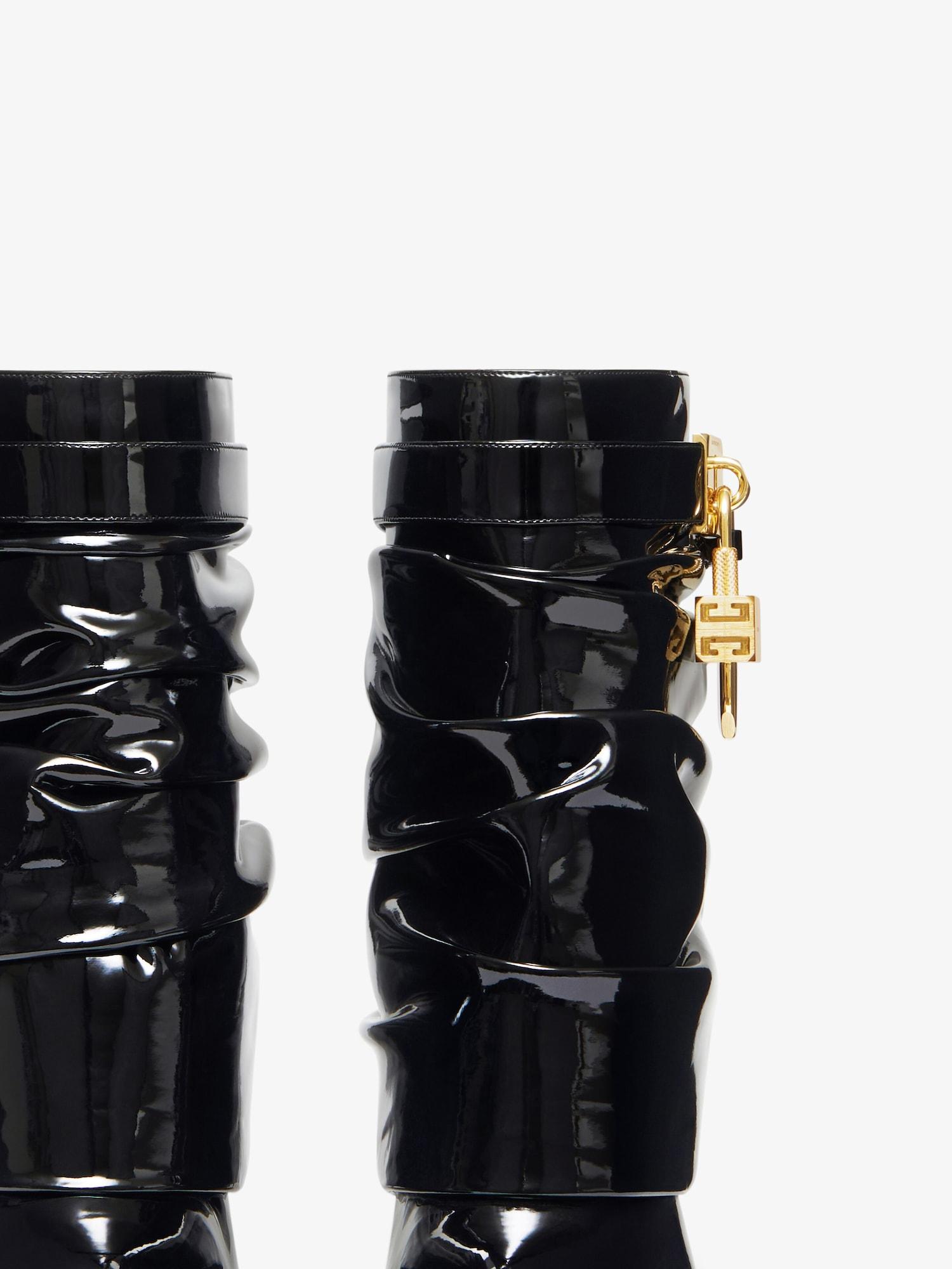 Shark Lock Stiletto ankle boots in latex Product Image